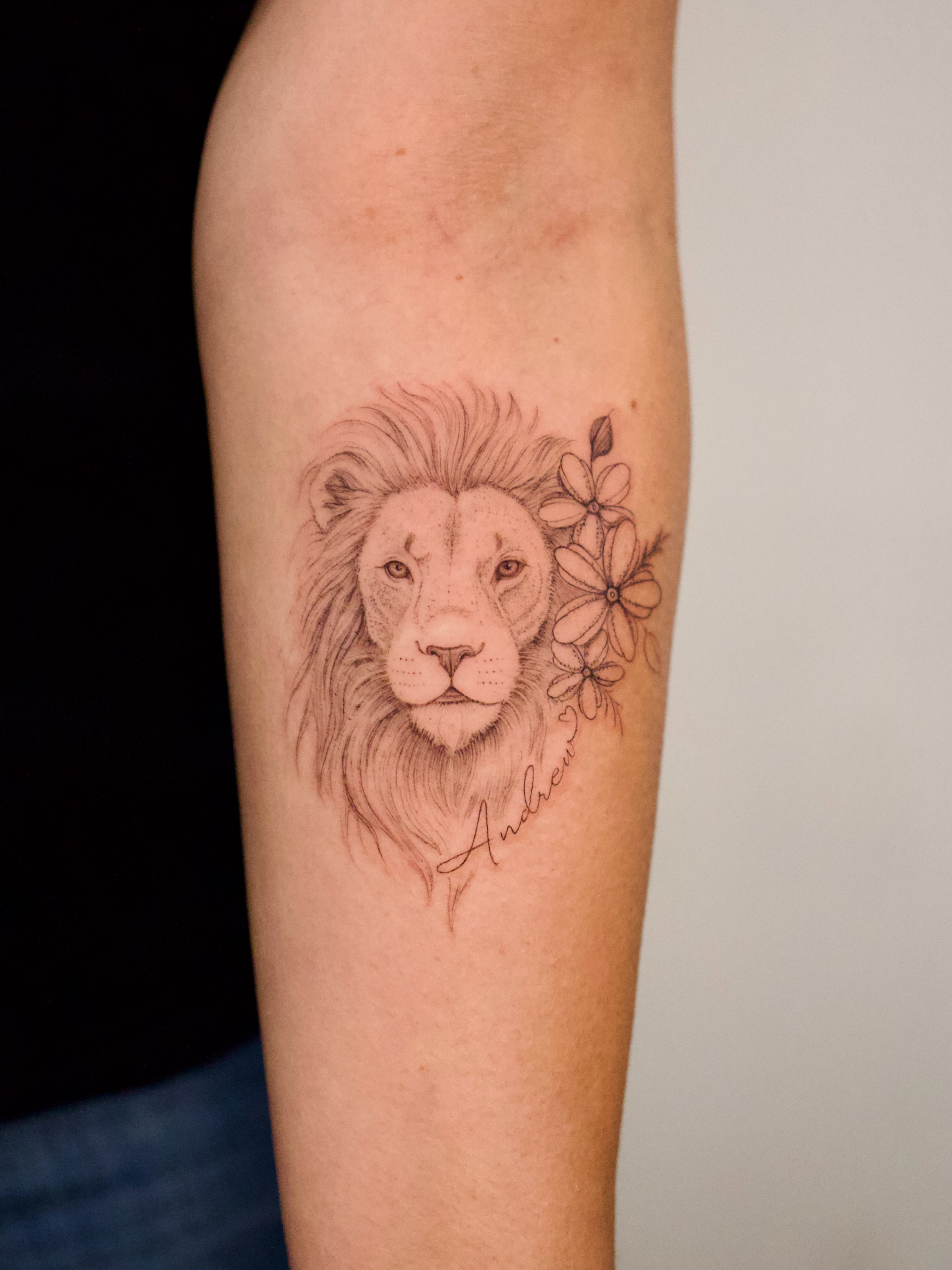 Lion realism tattoo on the forearm by Tattoo fine line NY