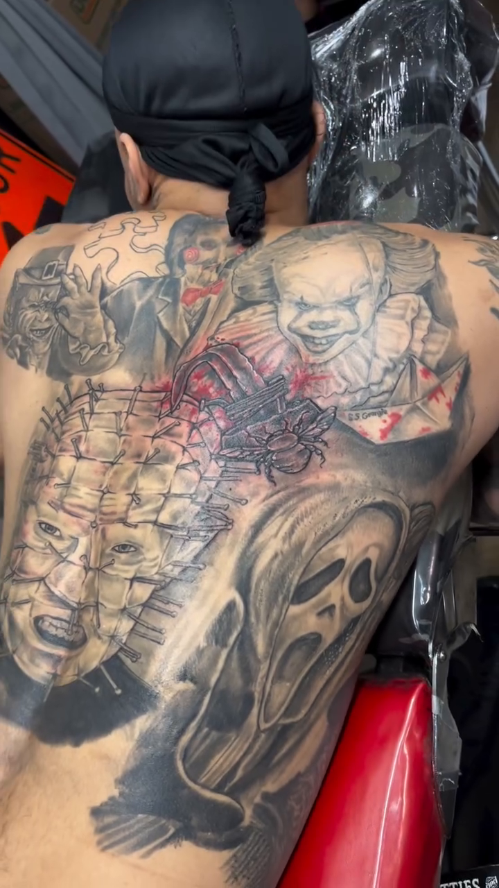 Realism tattoo on the back by Jakobi