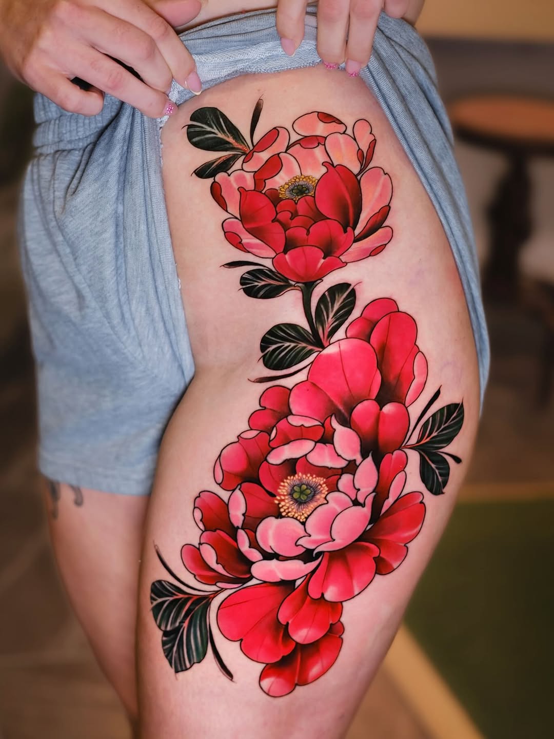 Peonies neo-traditional tattoo on the thigh by Andres Acevedo, Denver, Colorado