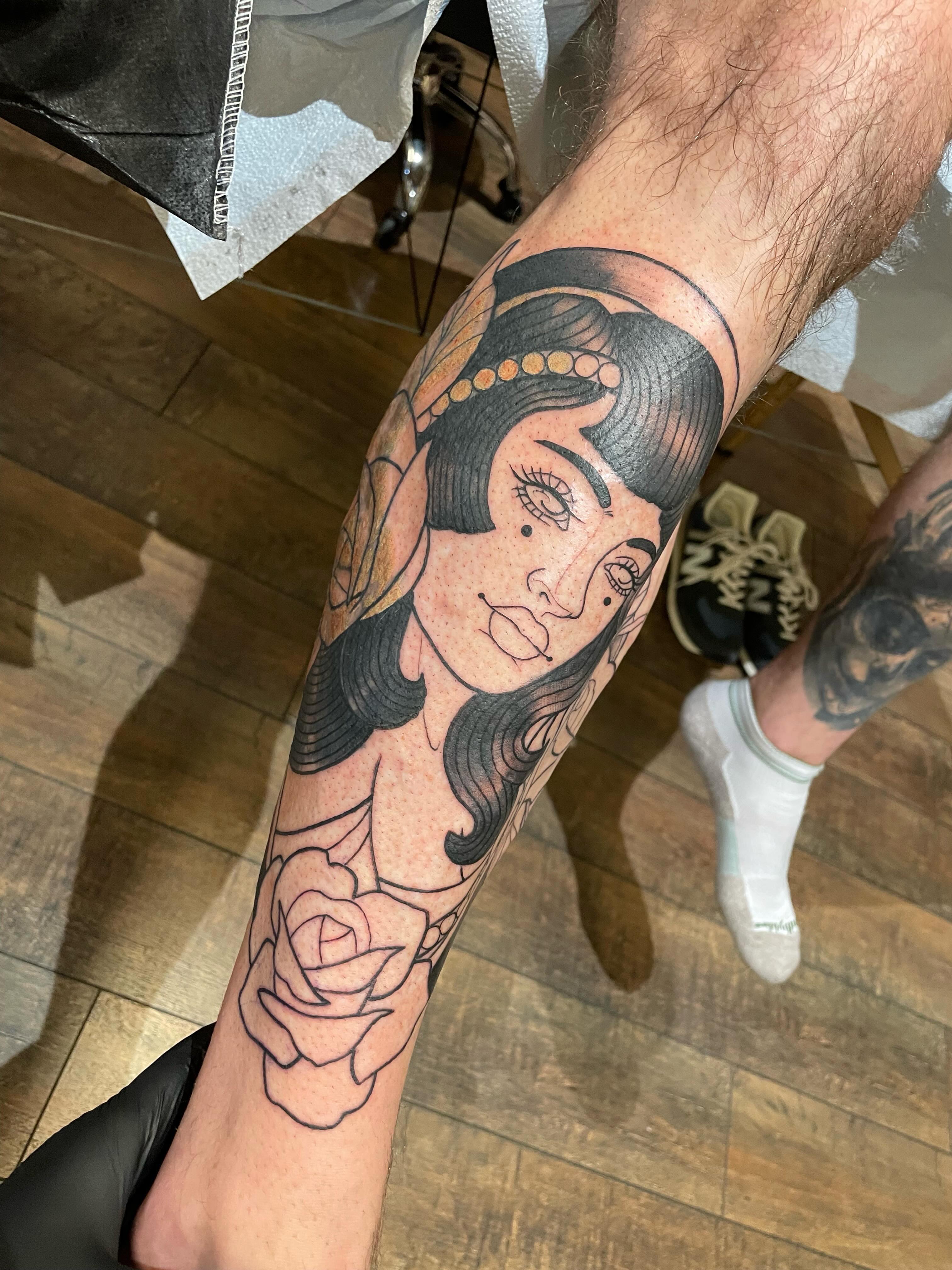 Woman with hat American traditional tattoo on the forearm by Tanya Murski