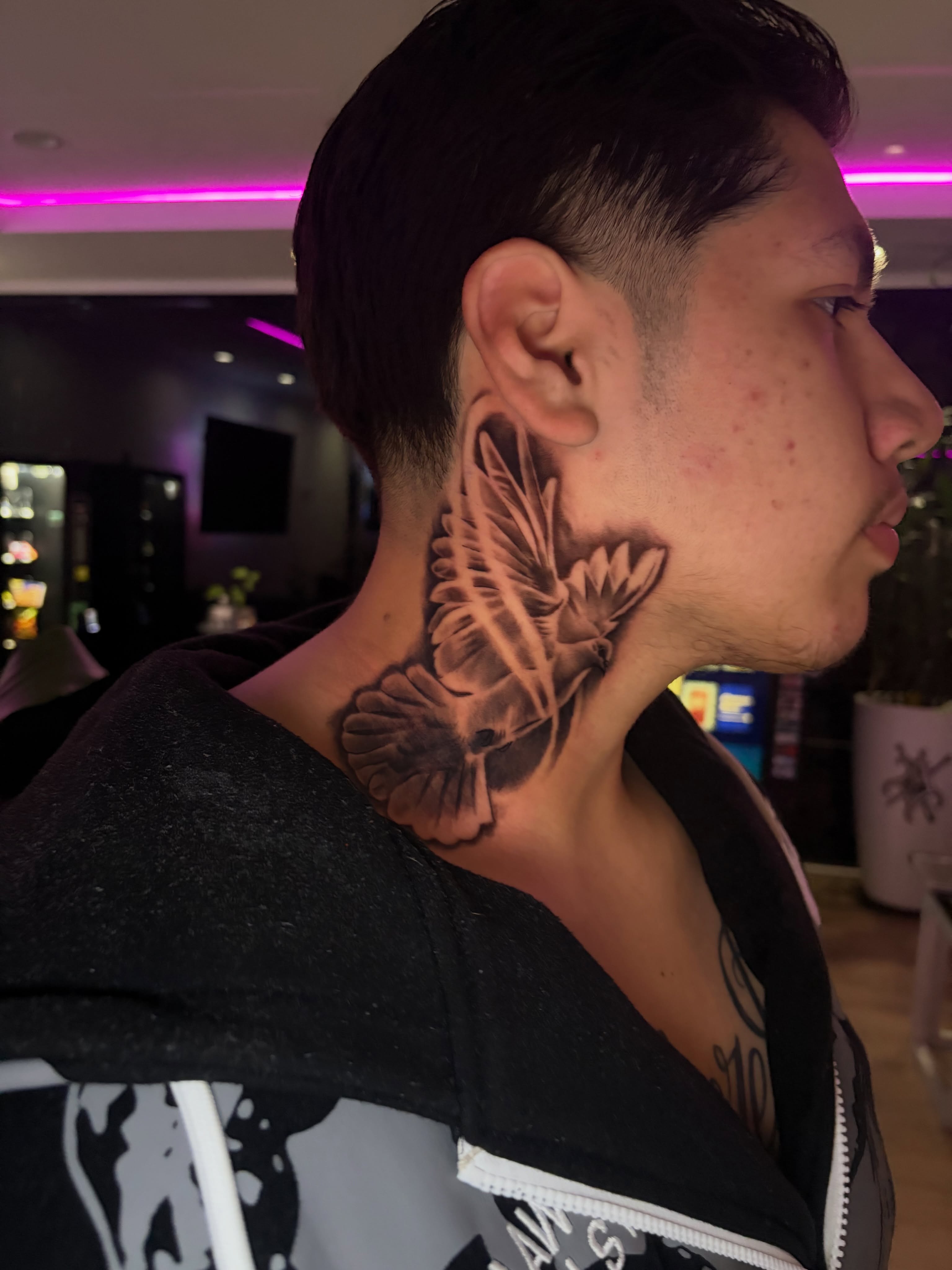 Butterfly black and grey tattoo on the neck by Luis VP
