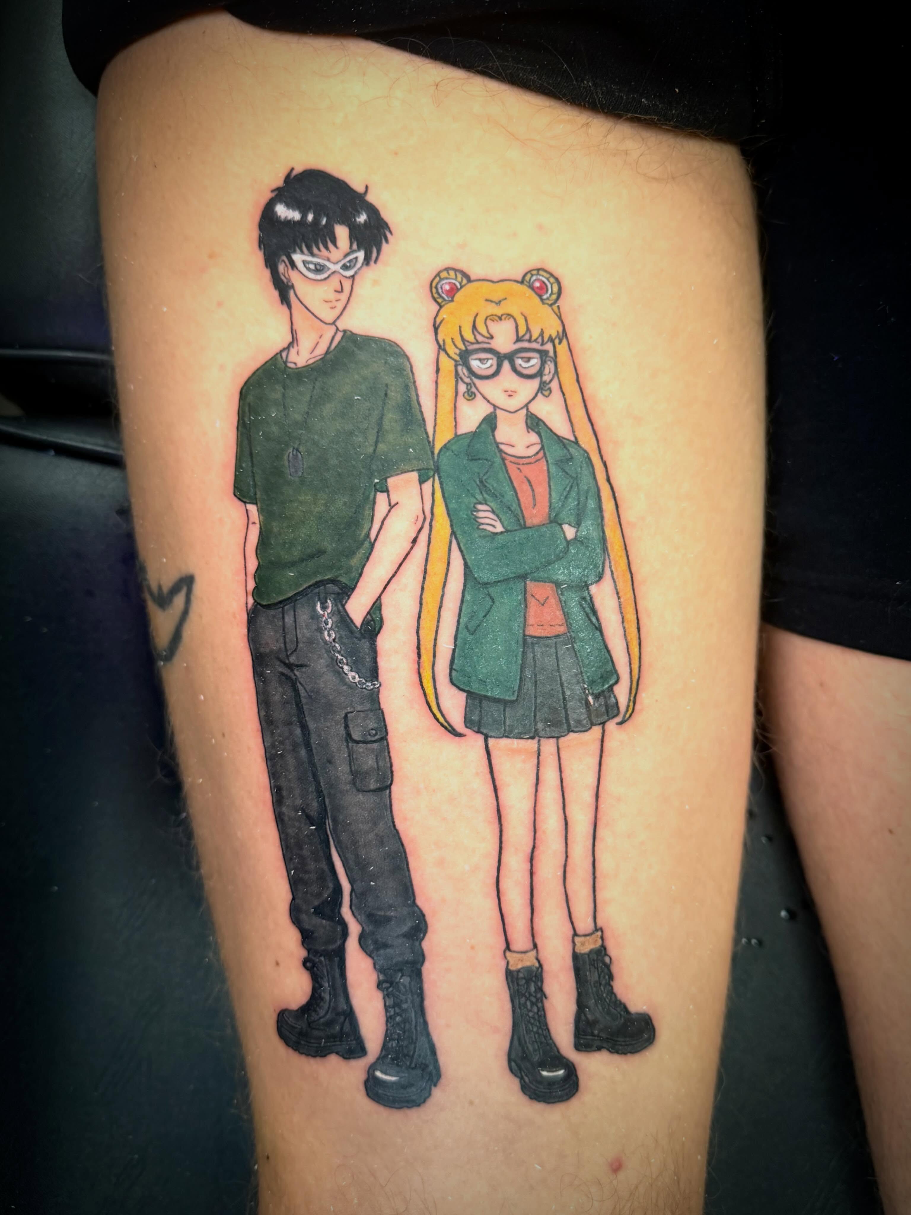 Anime characters anime tattoo on the thigh by Mikey