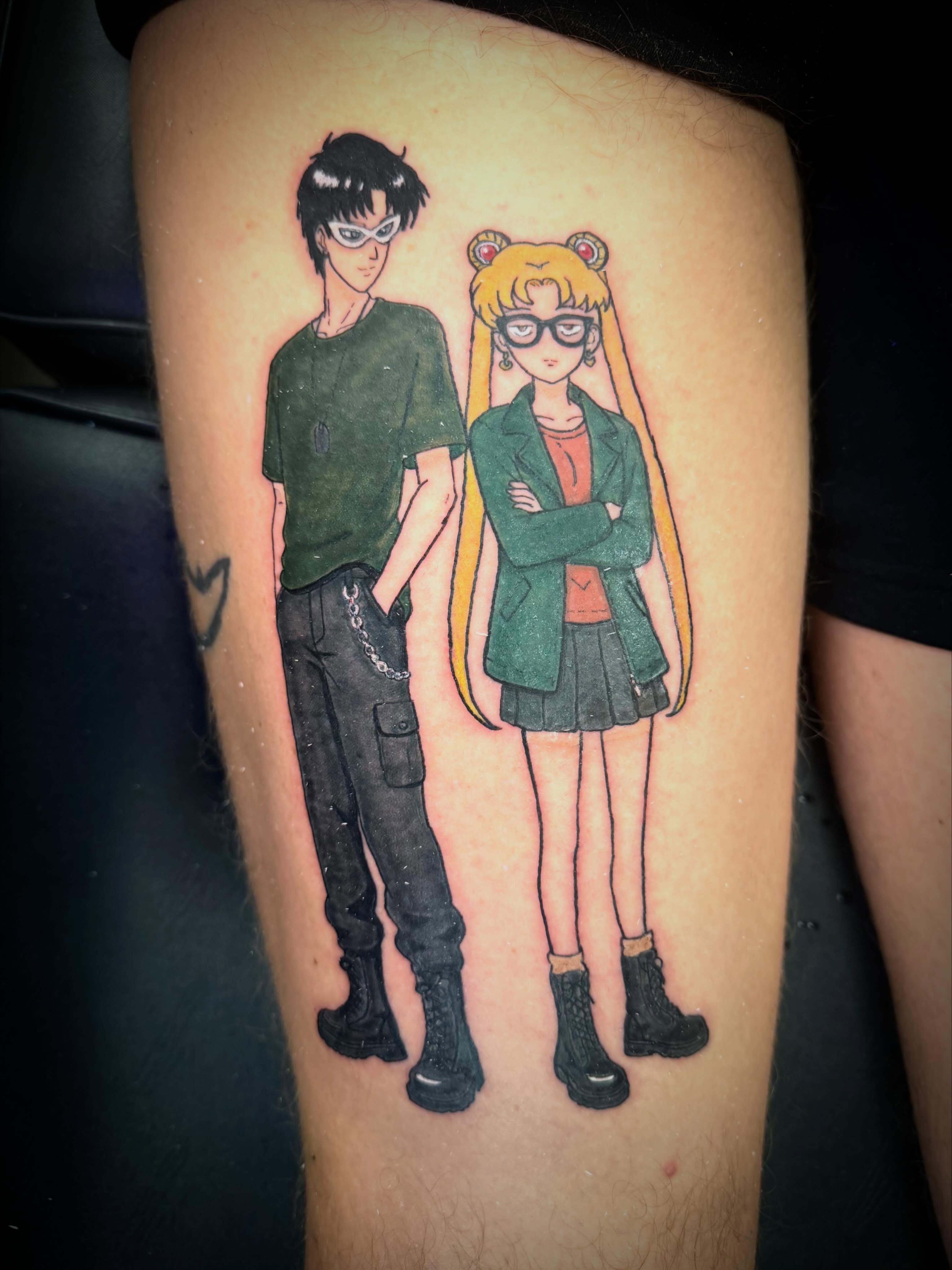 Anime characters anime tattoo on the thigh by Mikey