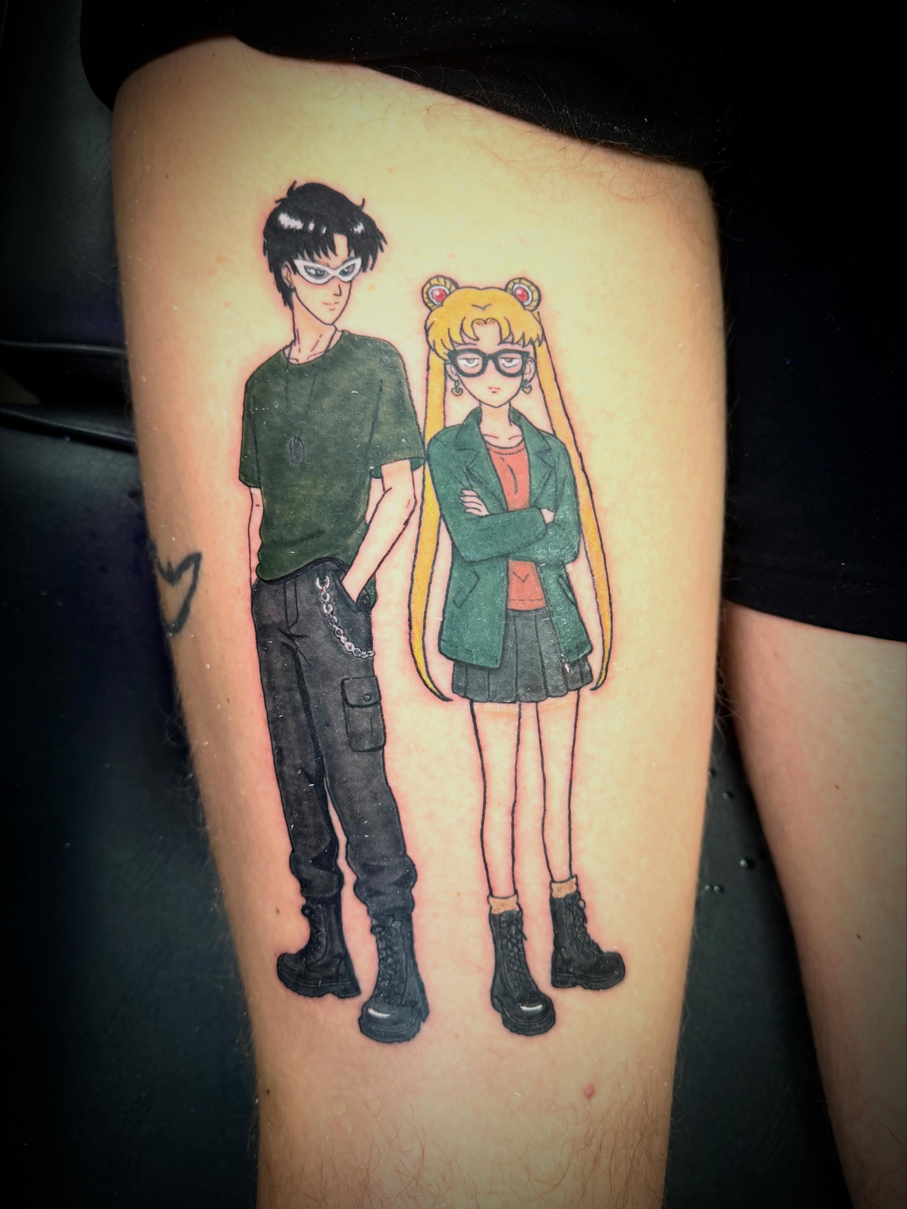Anime characters anime tattoo on the thigh by Mikey