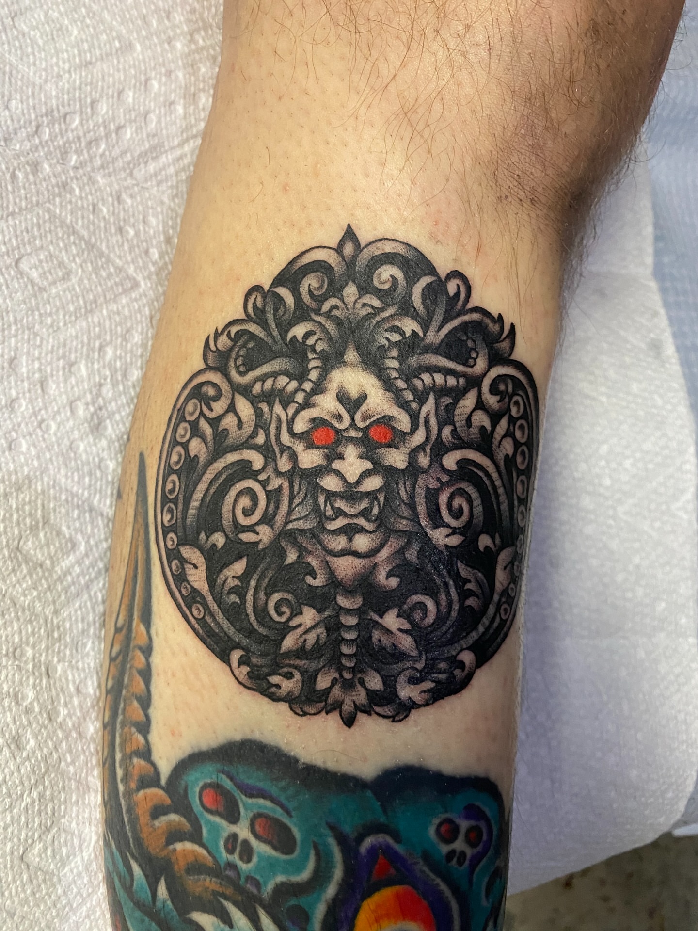 Medusa head black and grey tattoo on the forearm by sean drennen