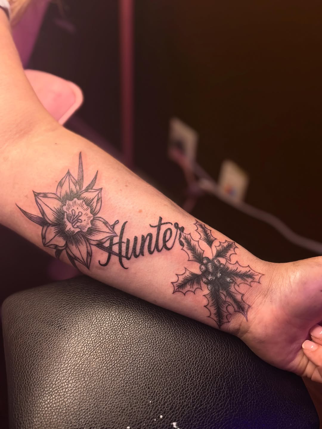 Tattoo by @santos.tattoos.official — lettering_script, black_and_grey