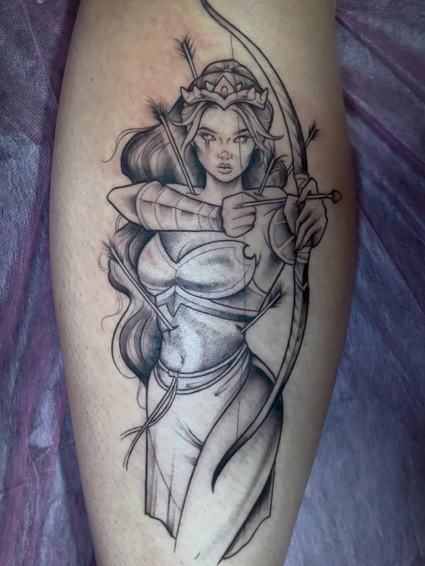 Archer woman realism tattoo on the thigh by Elixabeth