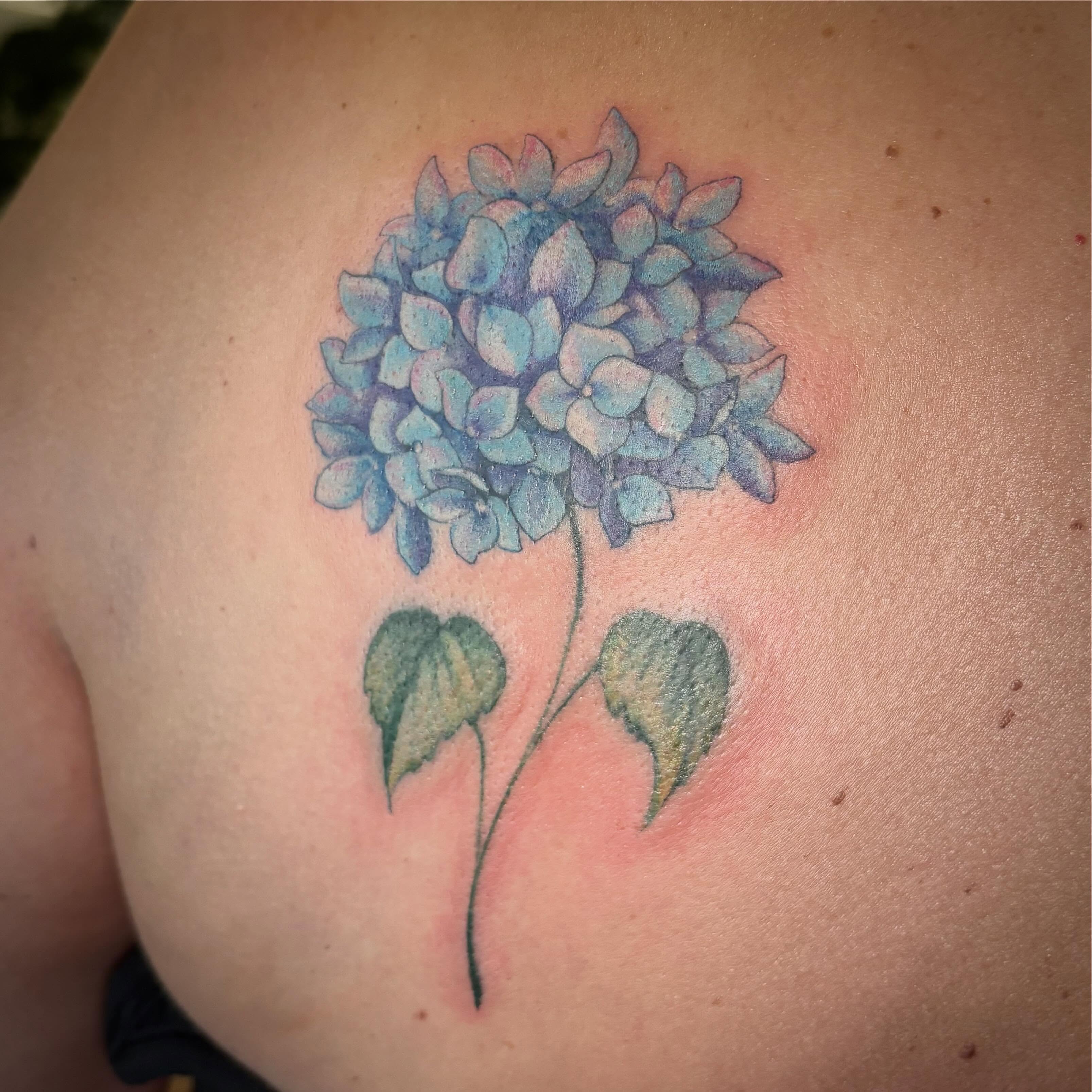 Tattoo by @tattoo.by.q — watercolor