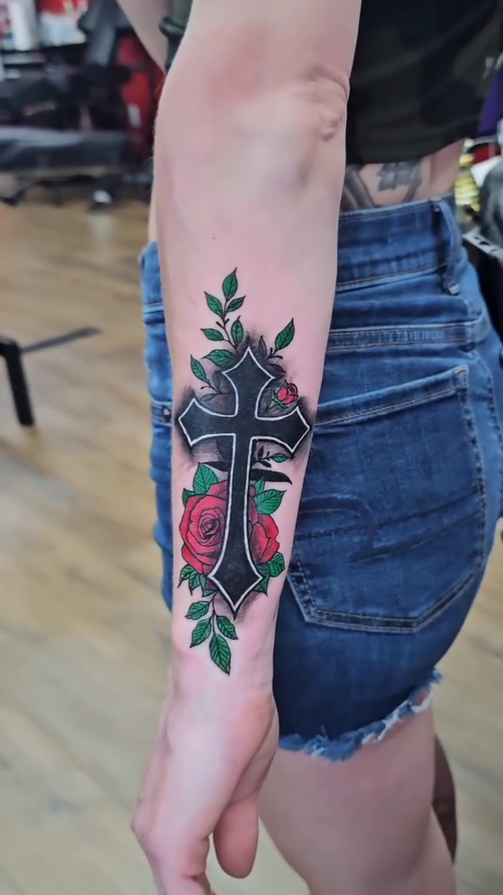 Cross with roses neo-traditional tattoo on the forearm by John Briceño, Columbus, Ohio