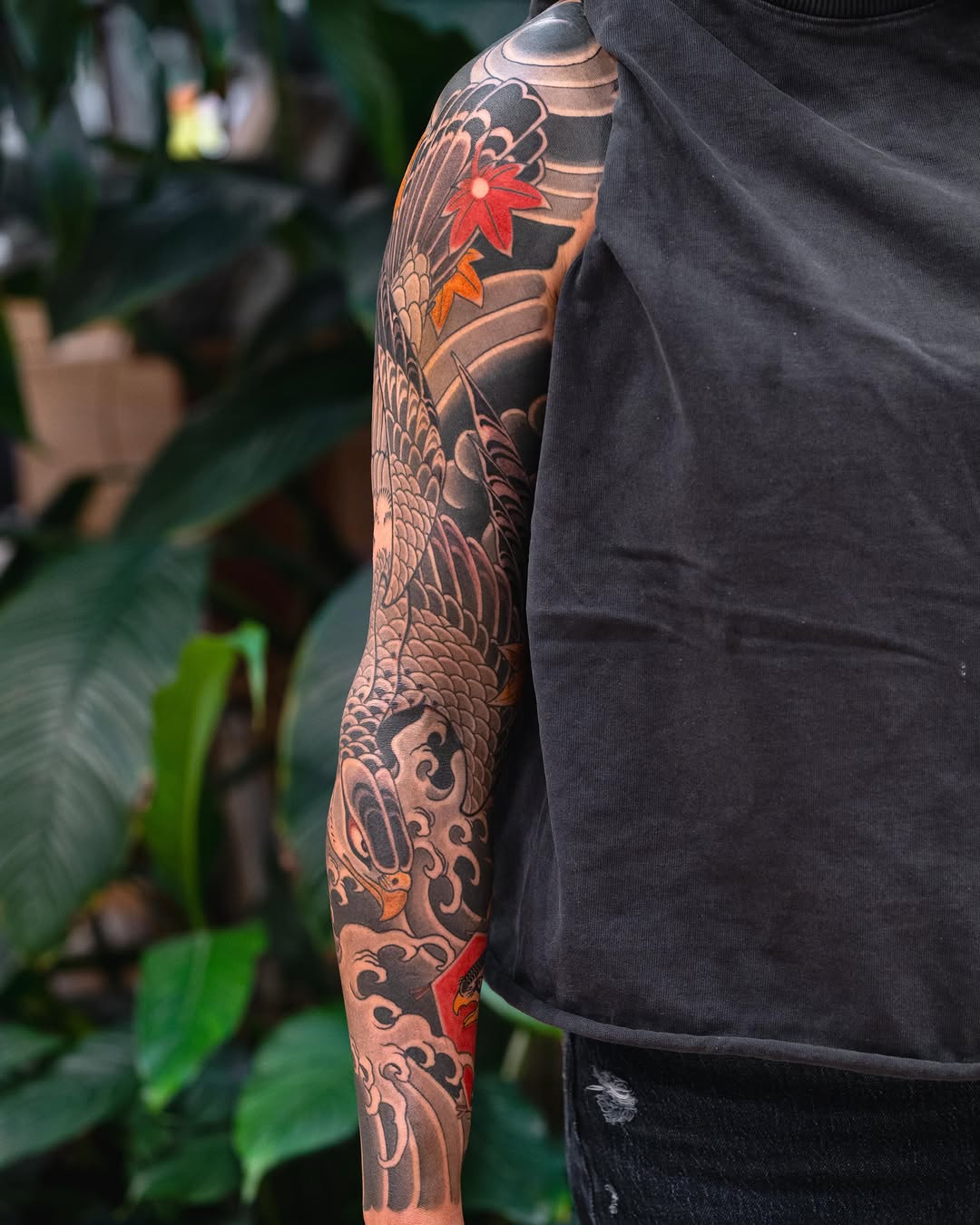 Dragon and maple leaves Japanese tattoo on the upper arm by Matt Leibo, San Francisco, California