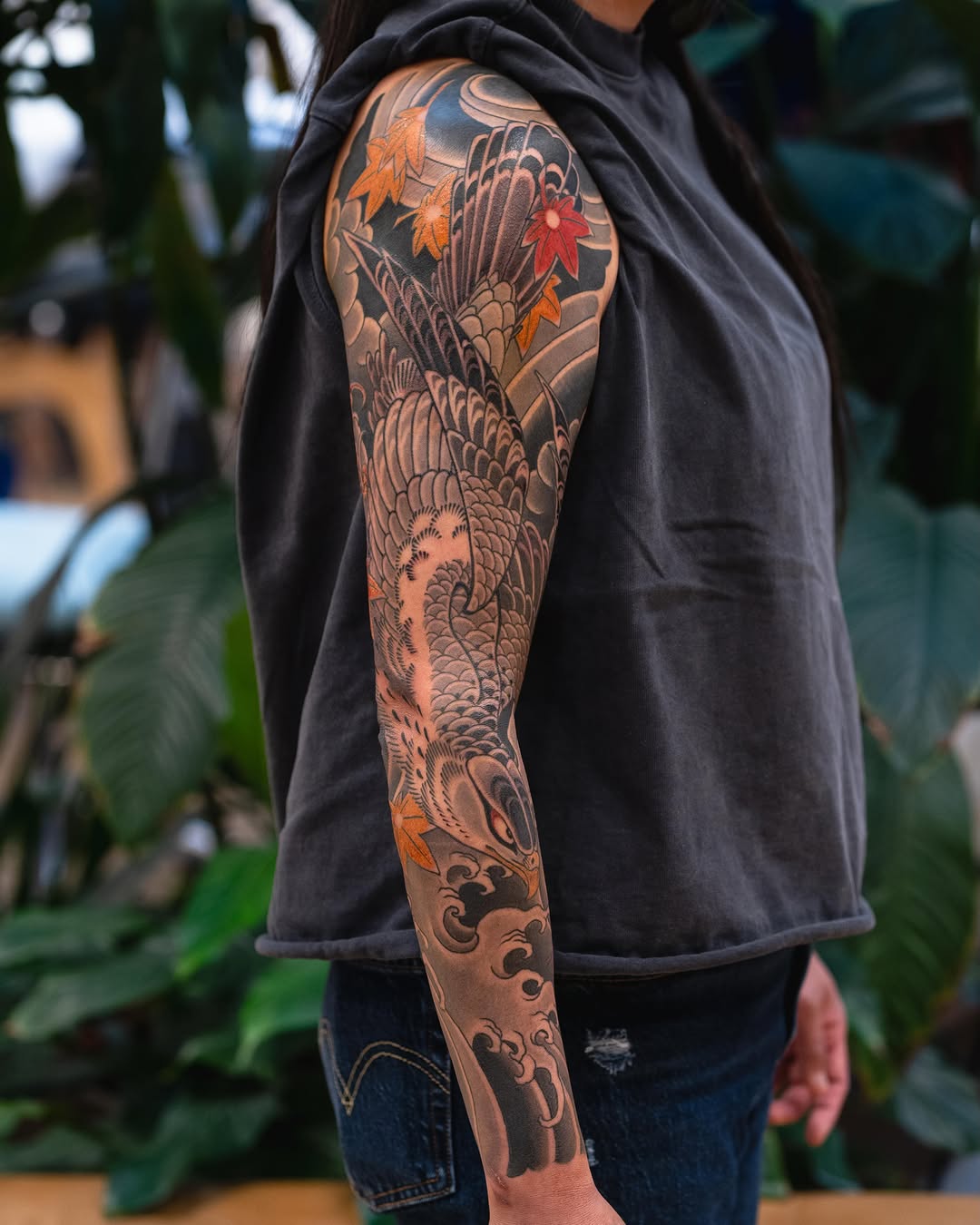 Dragon and maple leaves Japanese tattoo on the upper arm by Matt Leibo, San Francisco, California