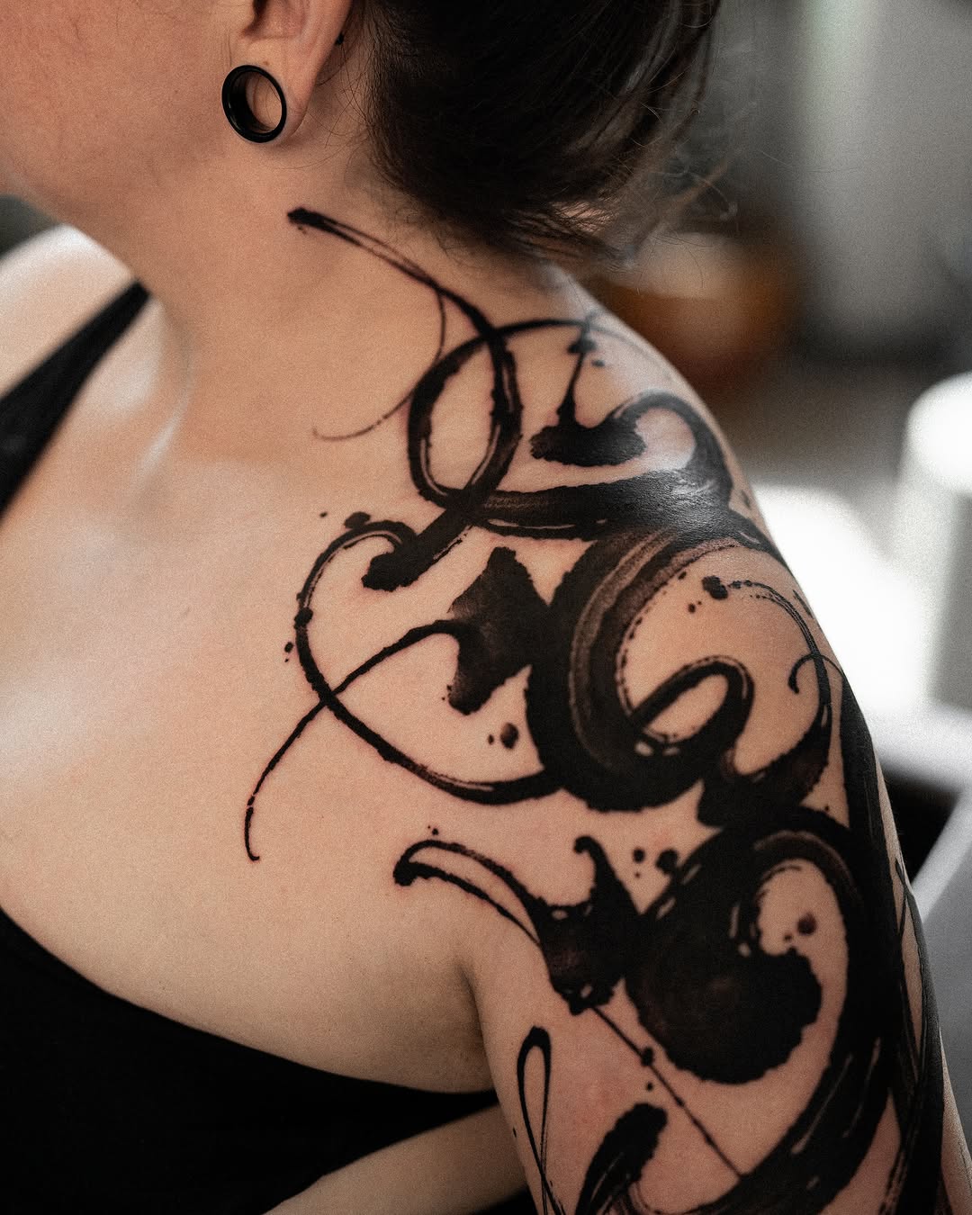 Abstract brush strokes cyber sigilism tattoo on the shoulder by Low, Brooklyn, New York