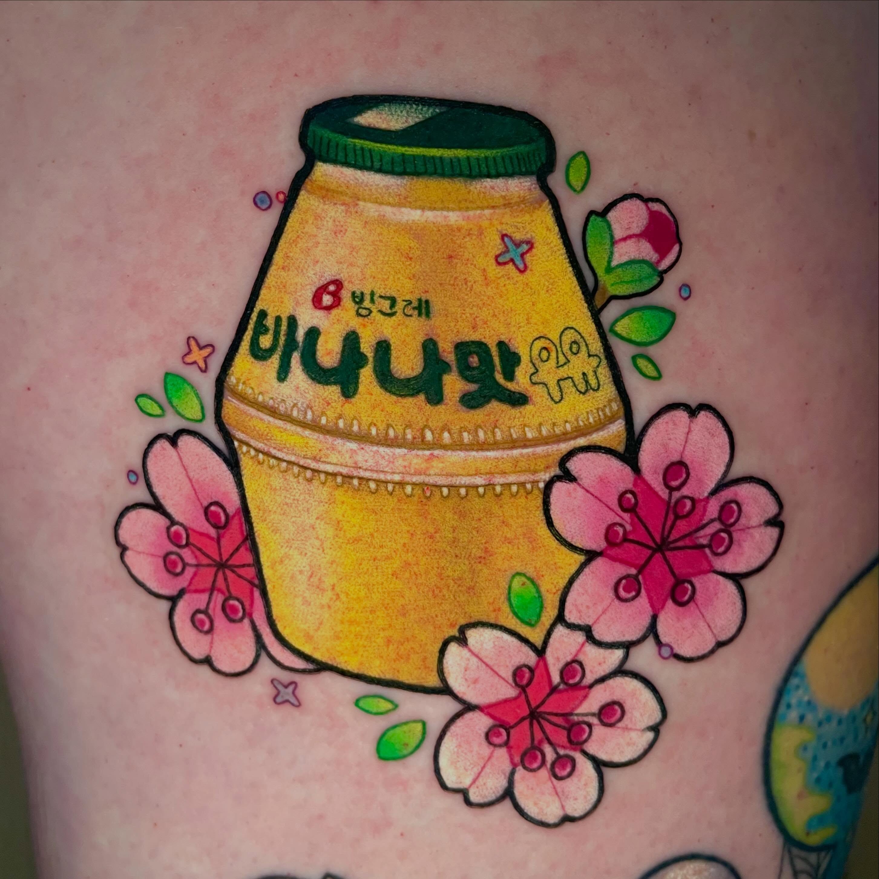 Banana-flavored drink bottle dotwork tattoo on the thigh by Shana 🍊Orlando,Fl