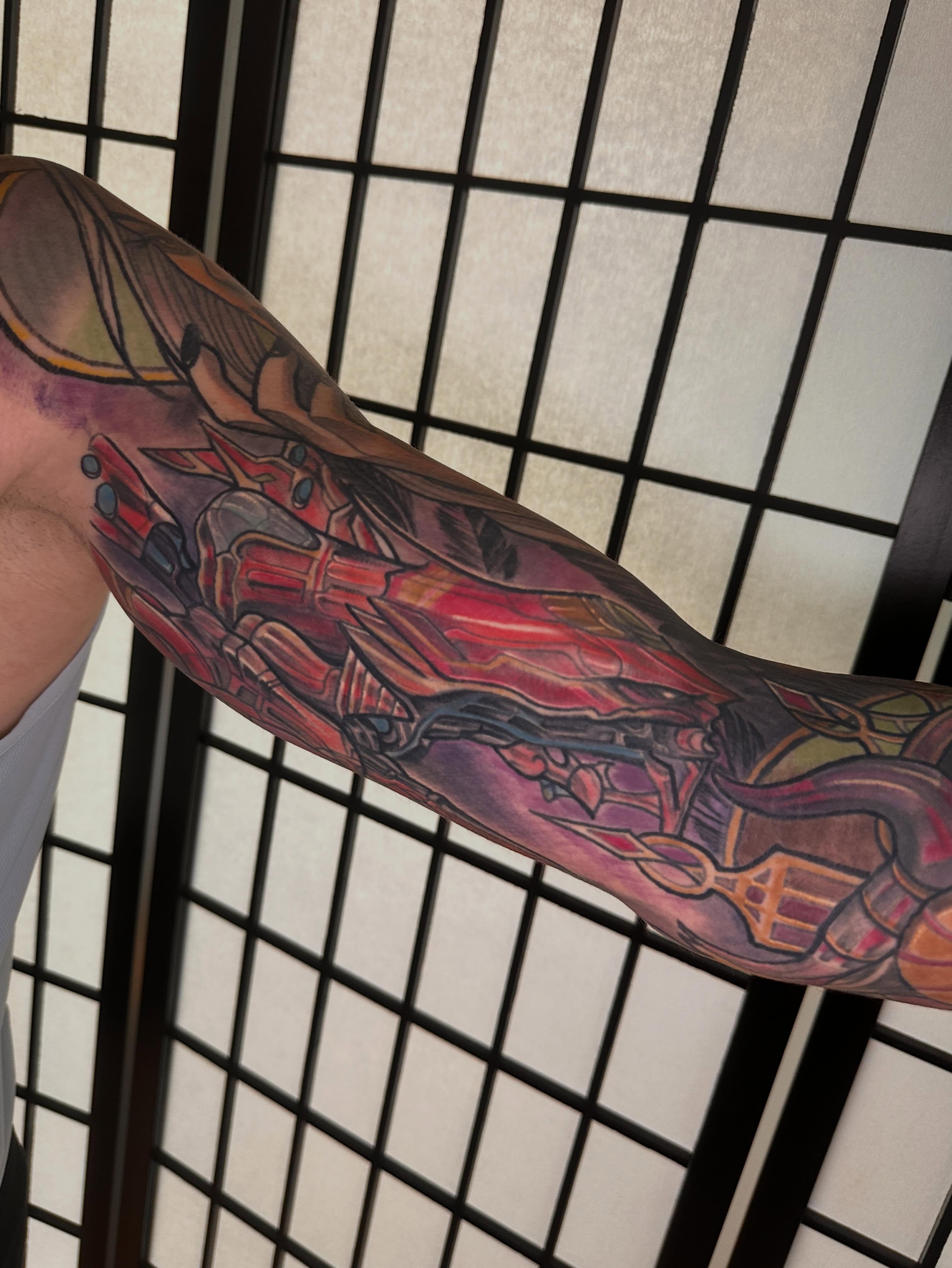 Mecha anime tattoo on the forearm by Javier Rivera
