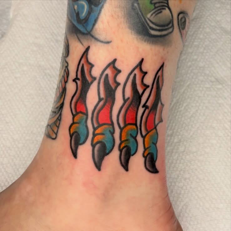 Flames American traditional tattoo on the foot by Braedon 🎱