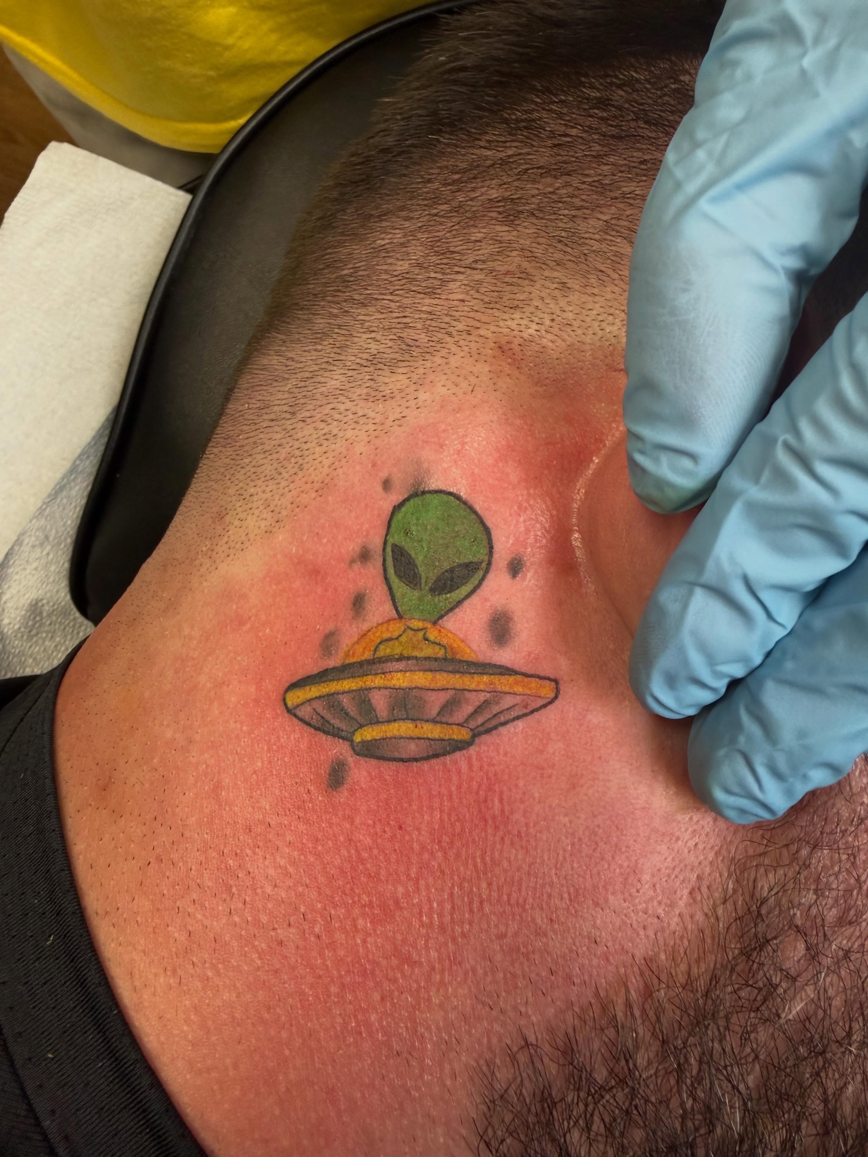Alien abduction new school tattoo on the back by Shane Fowler, Massillon, Ohio