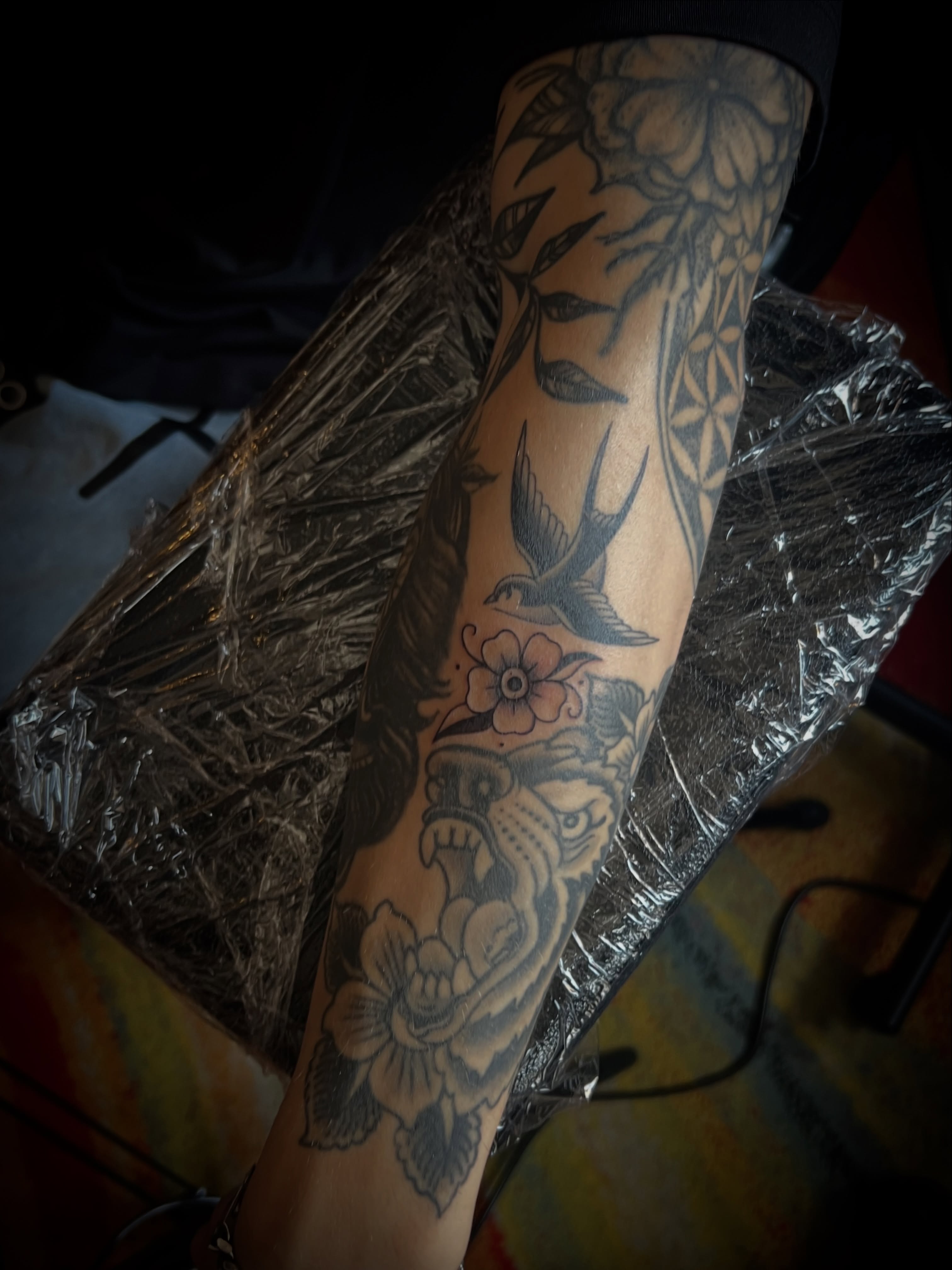 Swallow and flowers American traditional tattoo on the forearm by Elaine Nerowski ☾