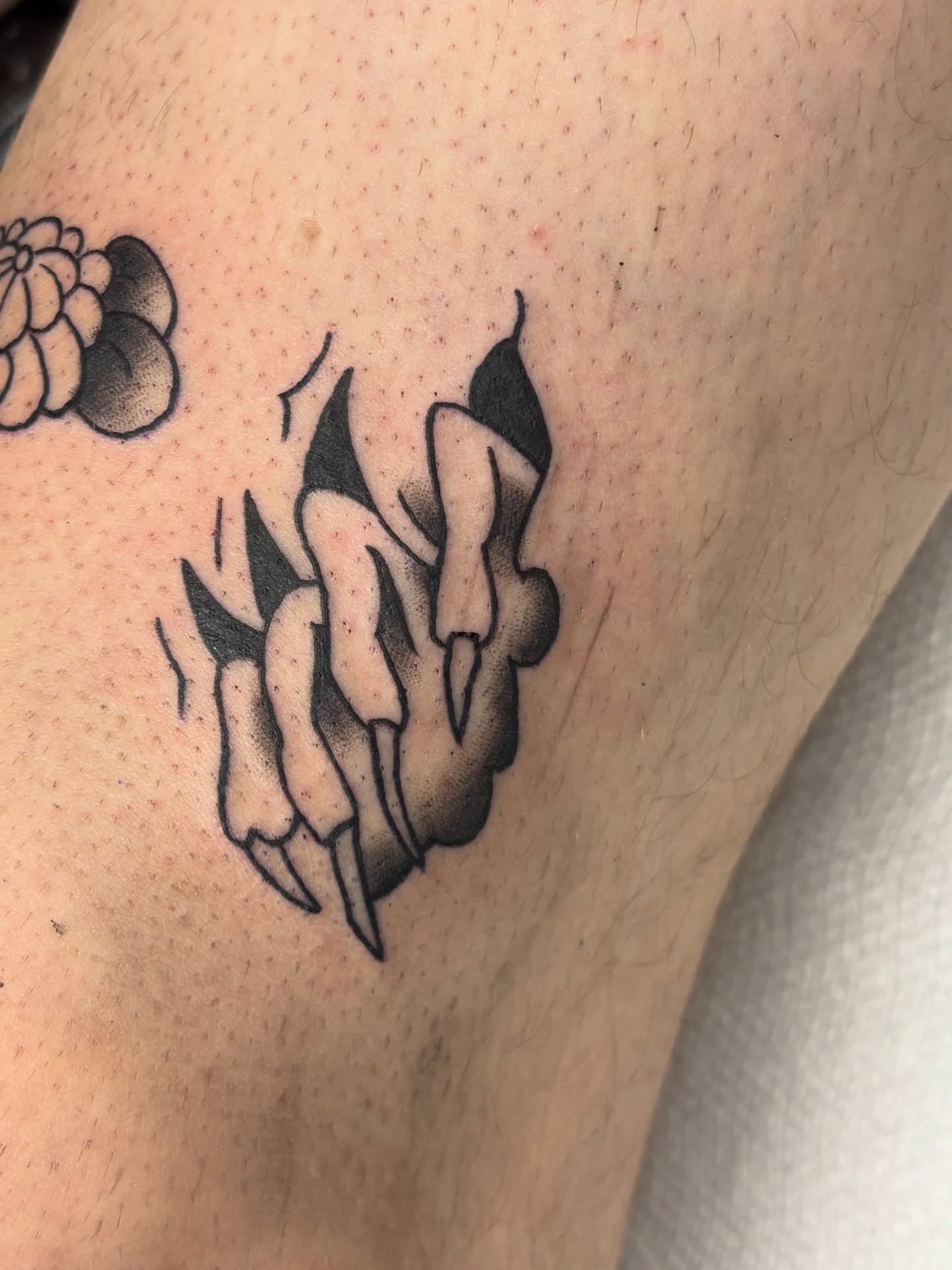 Claws black and grey tattoo on the forearm by Gabe Rosen