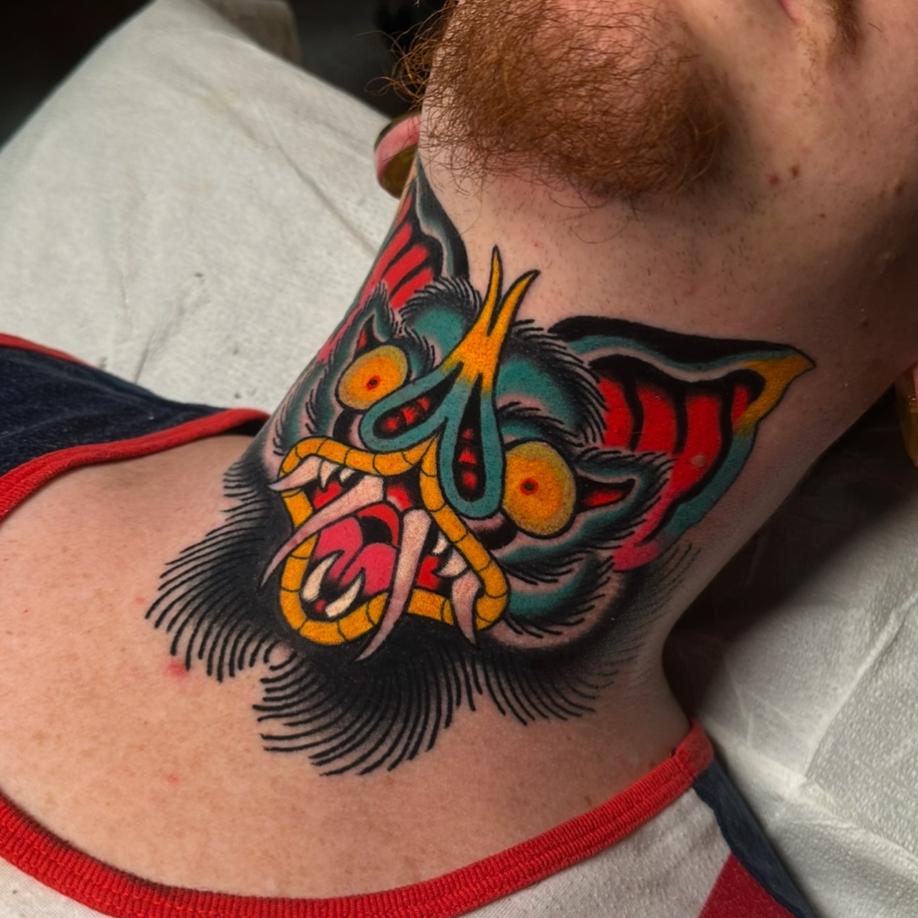 Monster American traditional tattoo on the neck by Schyler Ames, Canal Fulton, Ohio
