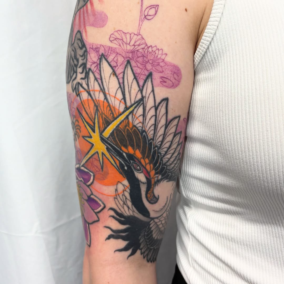 Bird new school tattoo on the forearm by Lu Taylor, Minneapolis, Minnesota