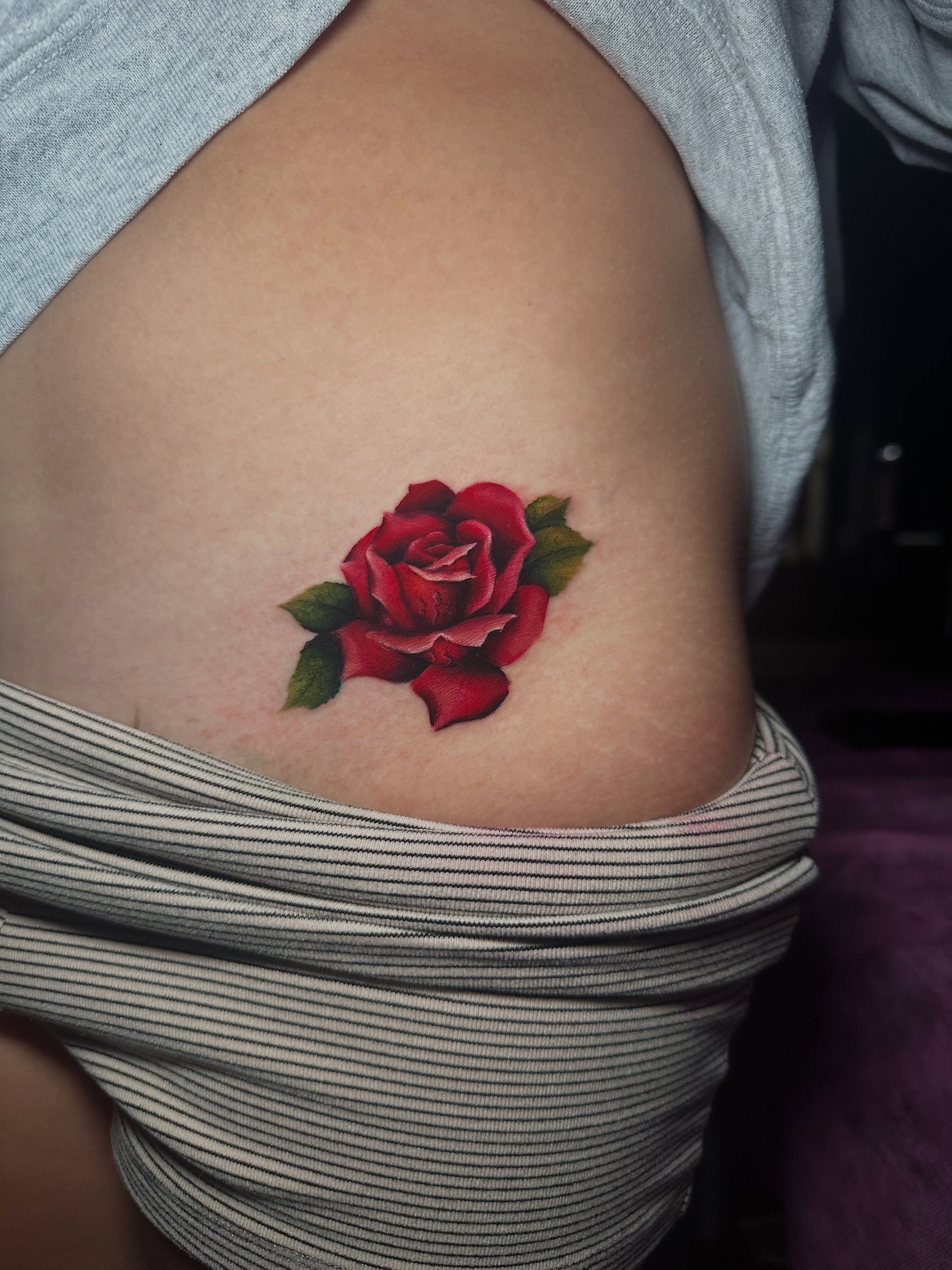 Red rose realism tattoo by Elizabeth’s Eclectic Tattoos