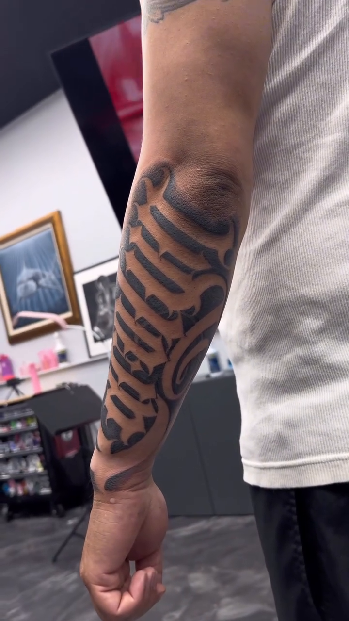Tattoo by @ironeyestattoo — lettering_script, blackwork