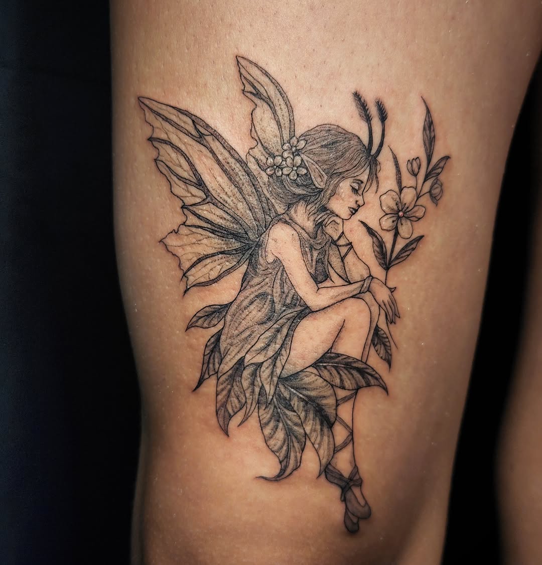 Fairy realism tattoo on the thigh by Ashly Renee
