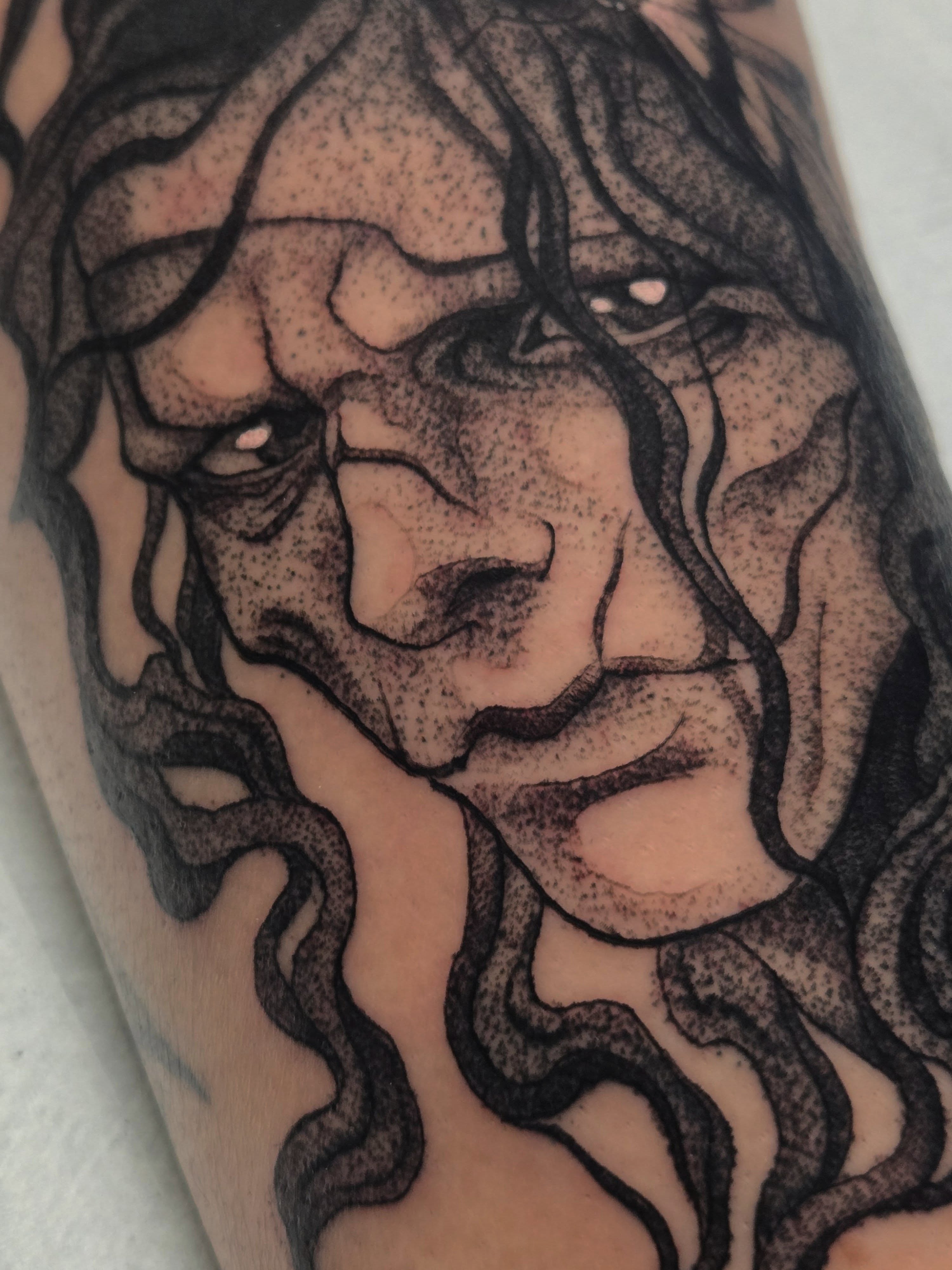 Man's face dotwork tattoo on the forearm by ◇  Kristyn Kay  ◇ Tattoo Warlock, Des Moines, Iowa