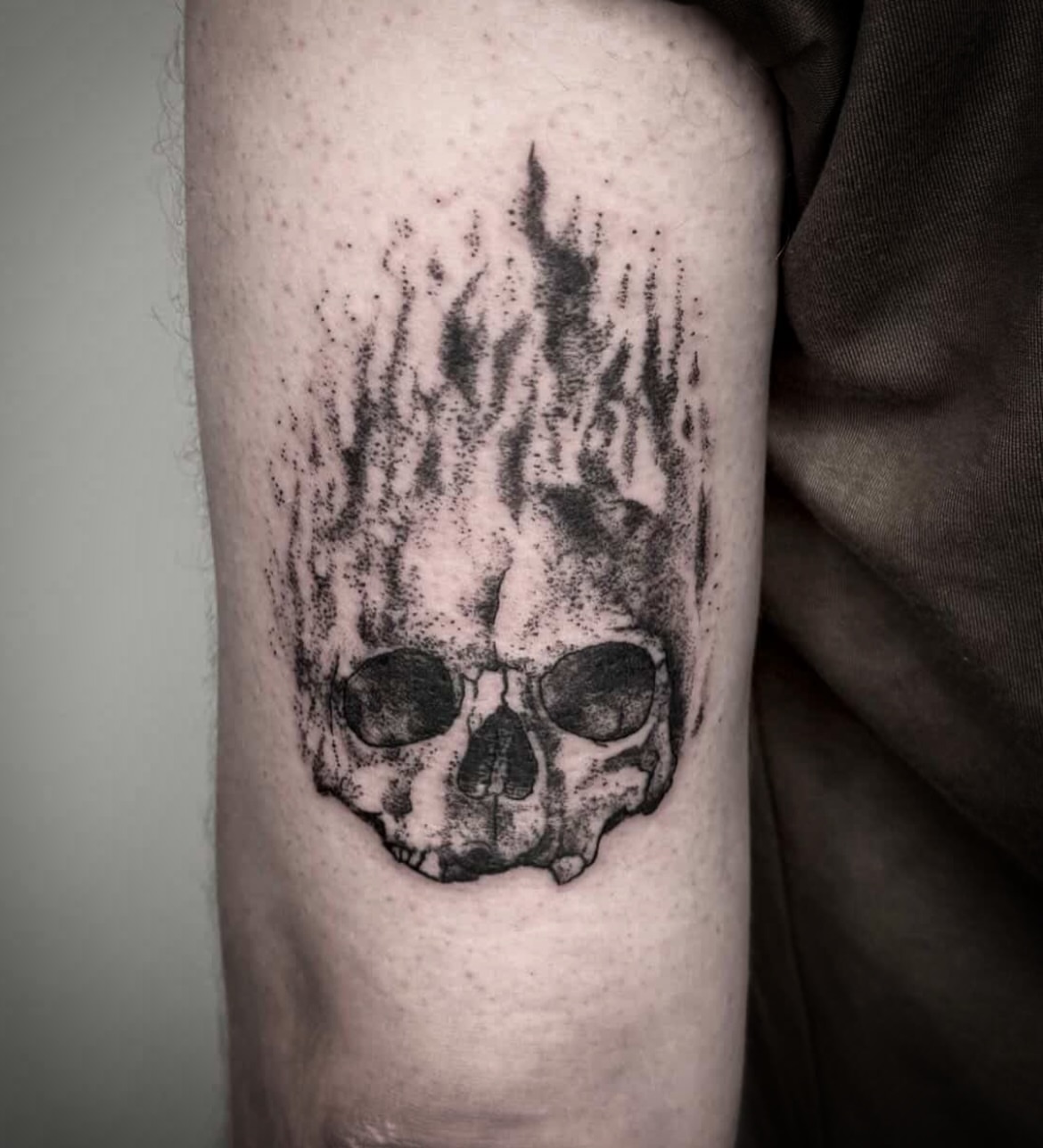 Flaming skull dotwork tattoo on the forearm by Tattoo Artist, Philadelphia, Pennsylvania