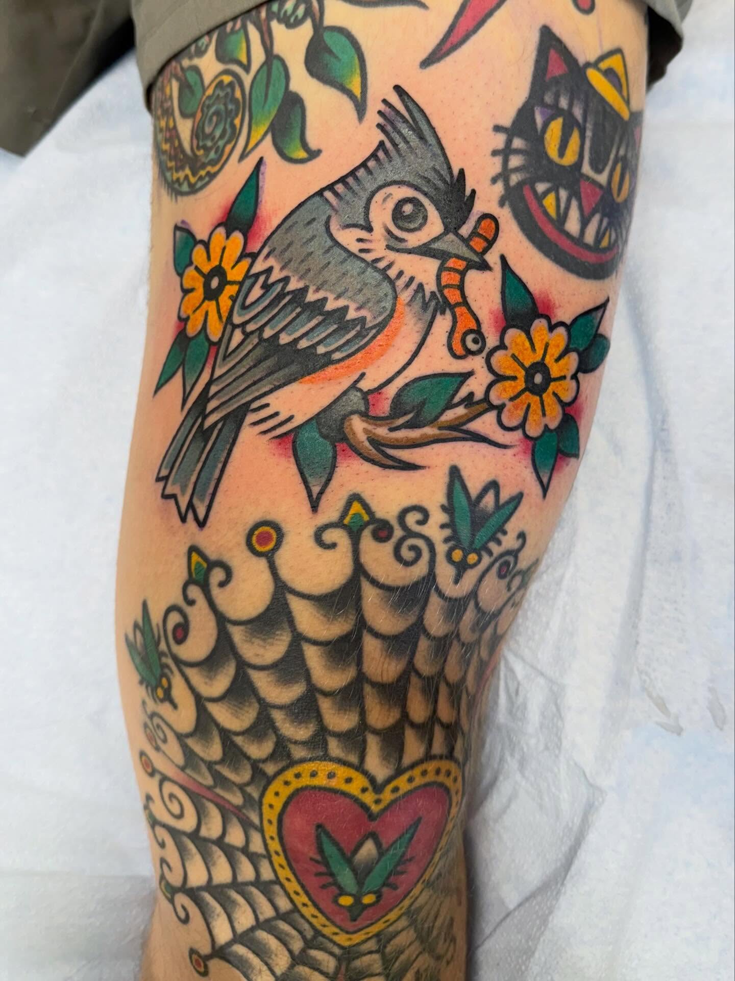 Bird and flowers American traditional tattoo on the leg by Matt Paw