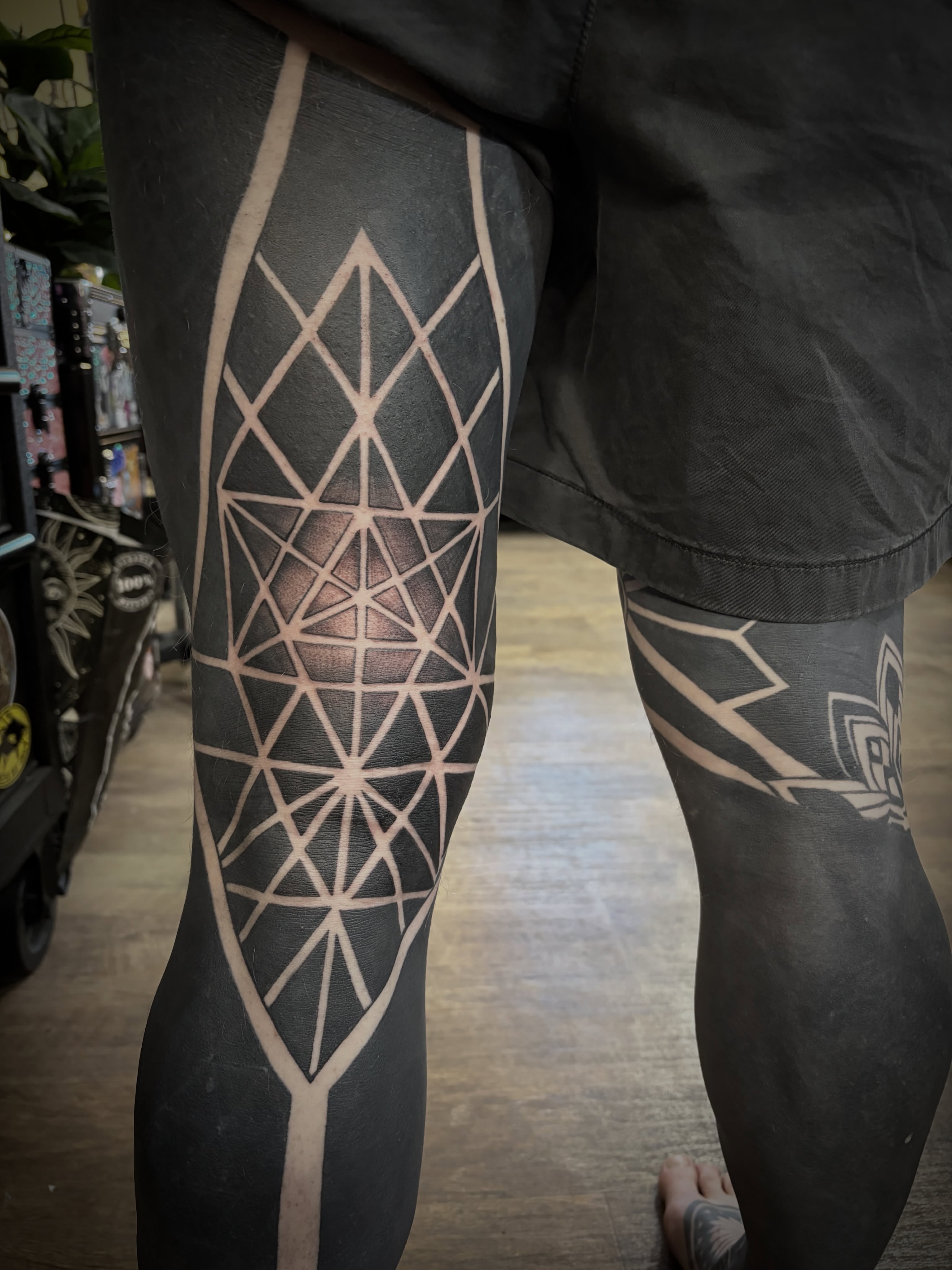 Tattoo by @theblackdottattoo — geometric