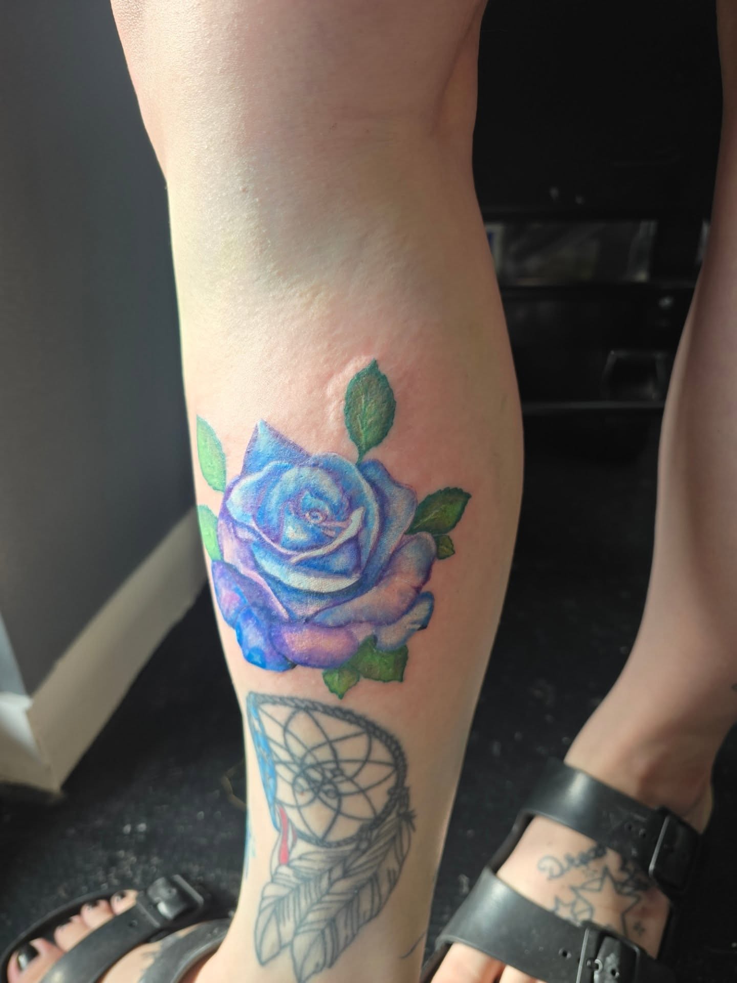Blue rose realism tattoo on the forearm by Maddox Kitson🕷