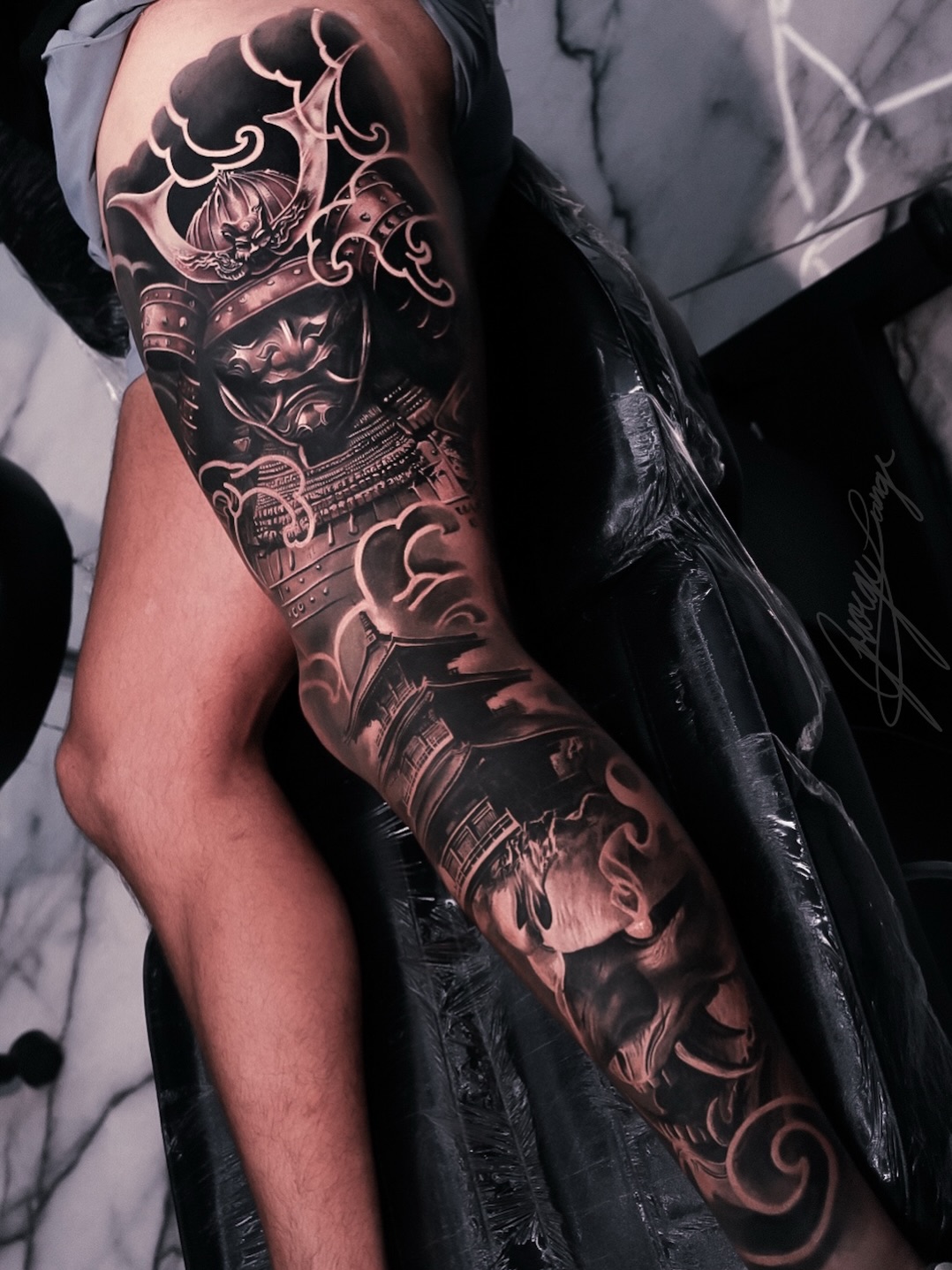 Samurai armor and temple Japanese tattoo on the forearm by George Lange