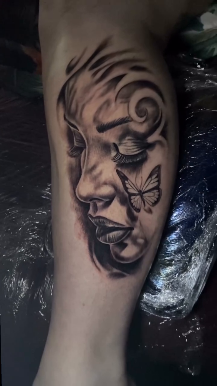 Woman with butterflies realism tattoo by Breyner, Cambridge, Massachusetts
