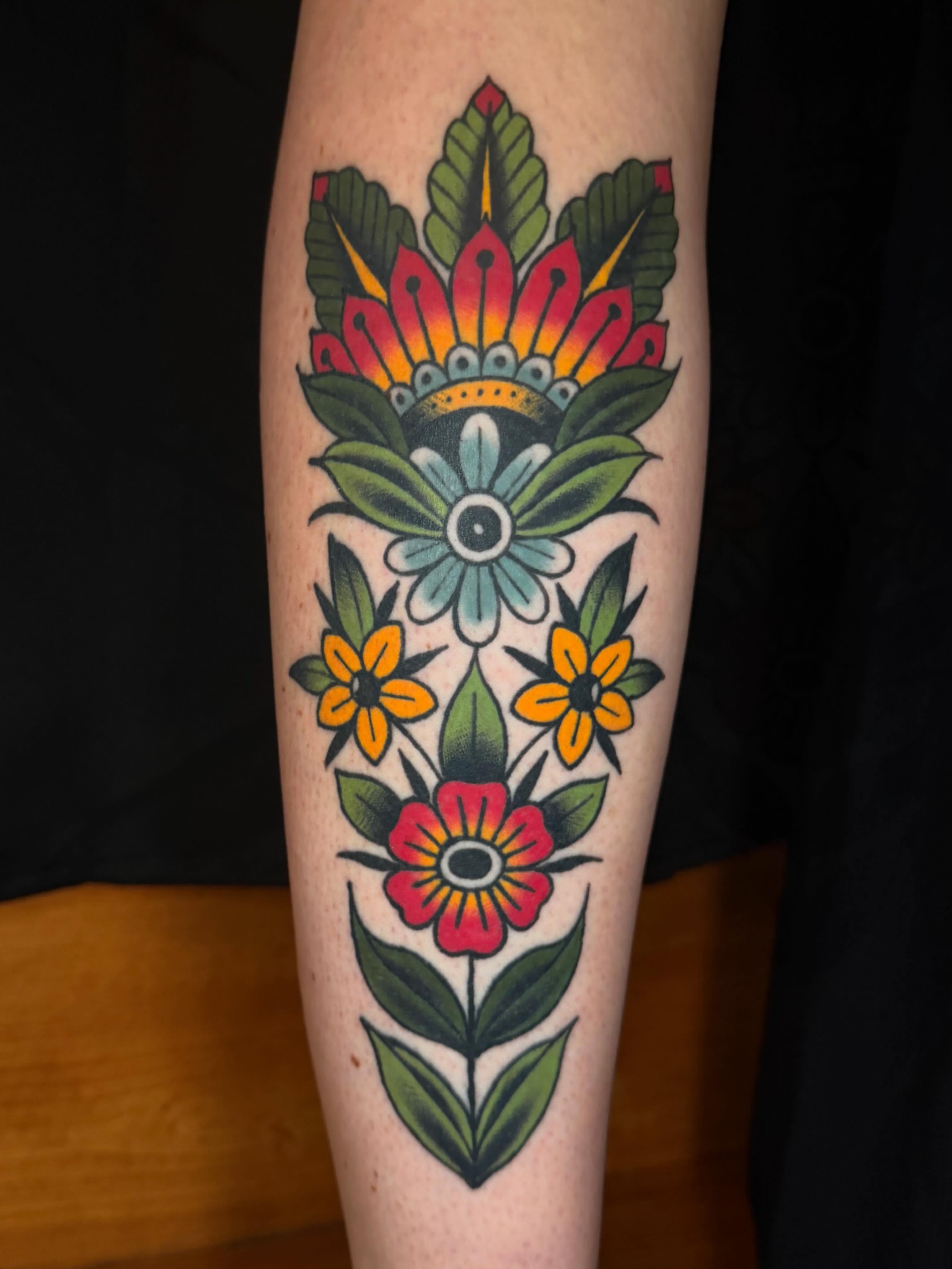 Floral arrangement American traditional tattoo on the forearm by ♥︎ ᴅᴇᴠ ʀᴇɴᴇᴇ ♥︎