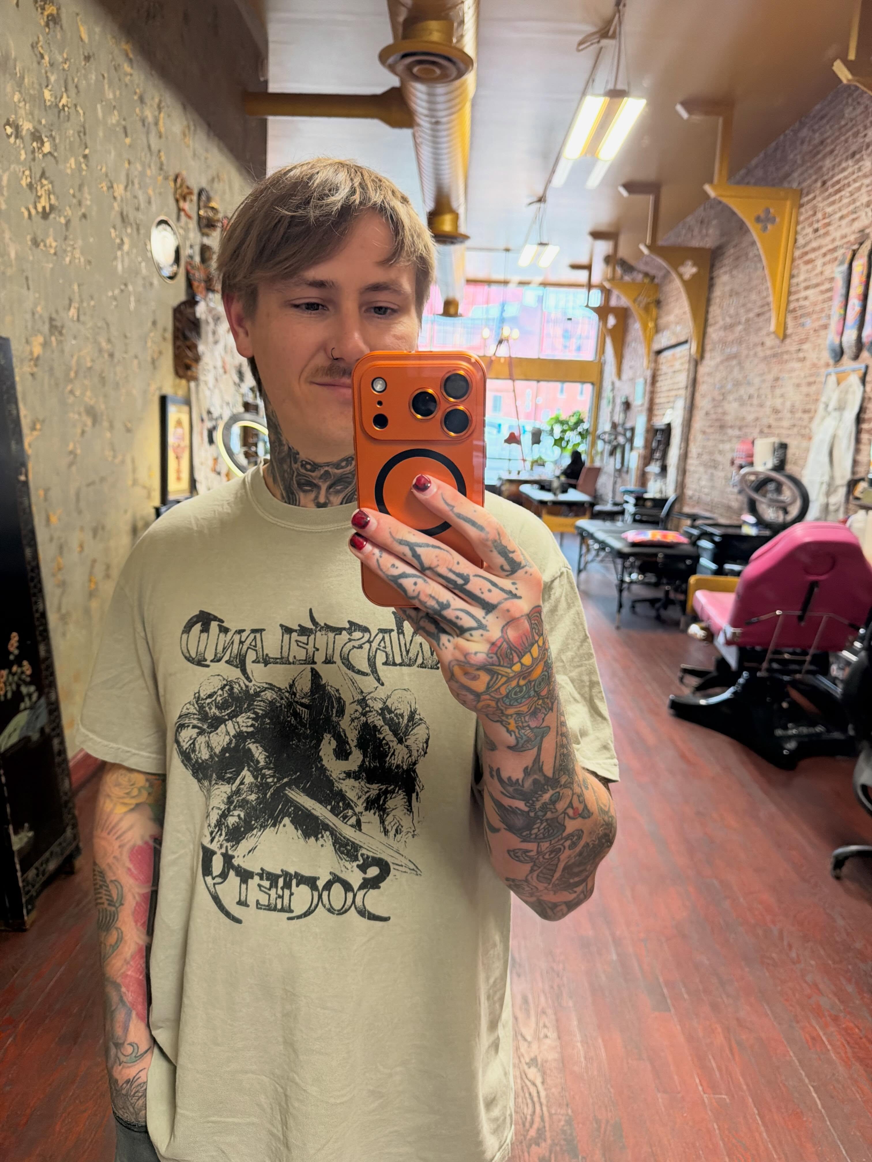 Tattooed arms black and grey tattoo on the upper arm by Evan Voelker