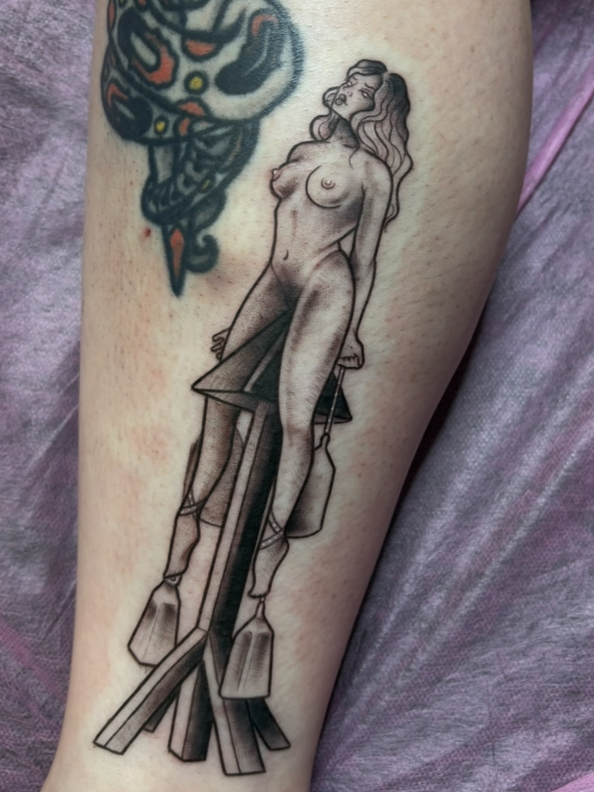 Divine female figure realism tattoo on the leg by Elixabeth