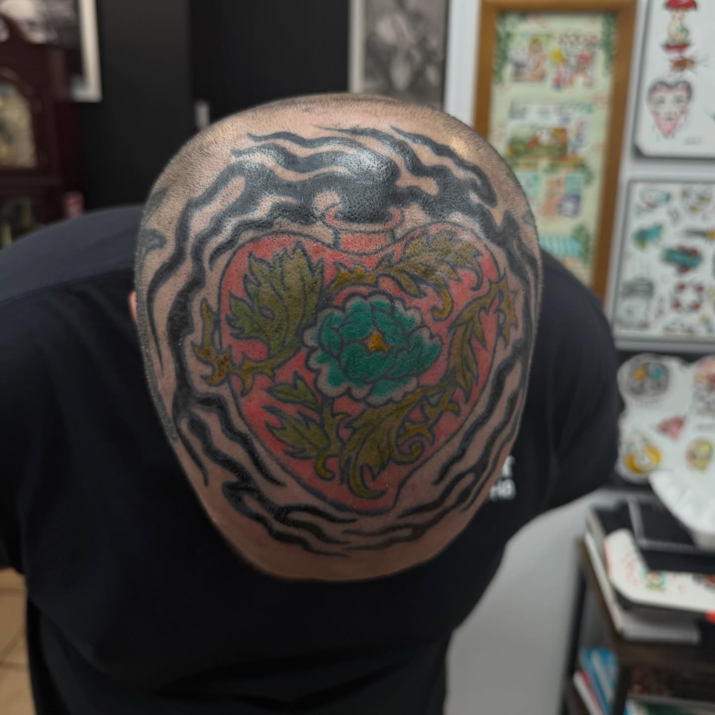 Floral heart American traditional tattoo on the head by c☮︎urt