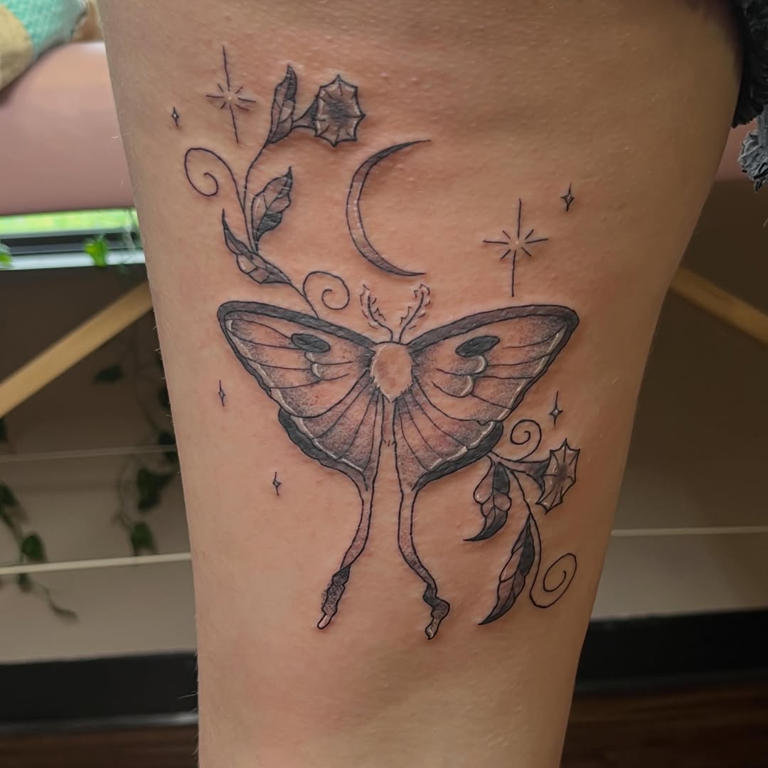 Luna moth with moon and stars fine line tattoo on the thigh by Jazzy