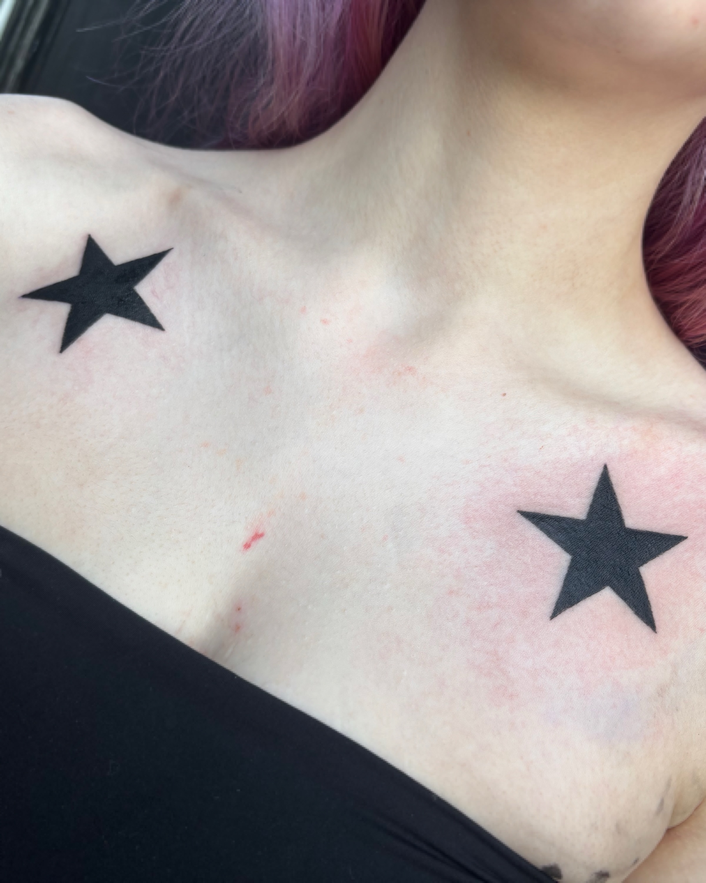 Stars black and grey tattoo on the neck by Cooper, Portland, Oregon