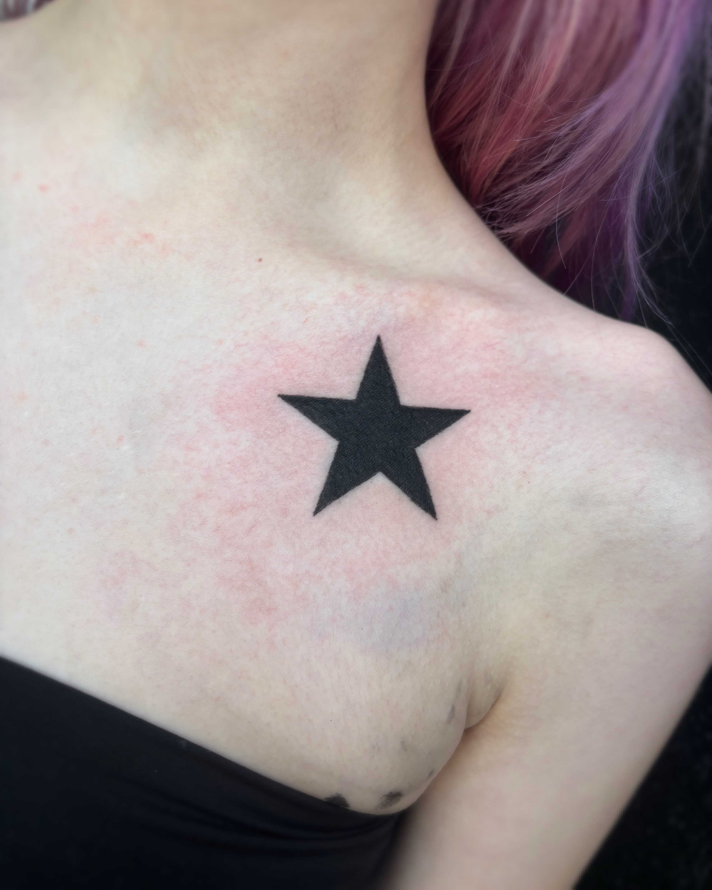 Star black and grey tattoo on the shoulder by Cooper, Portland, Oregon
