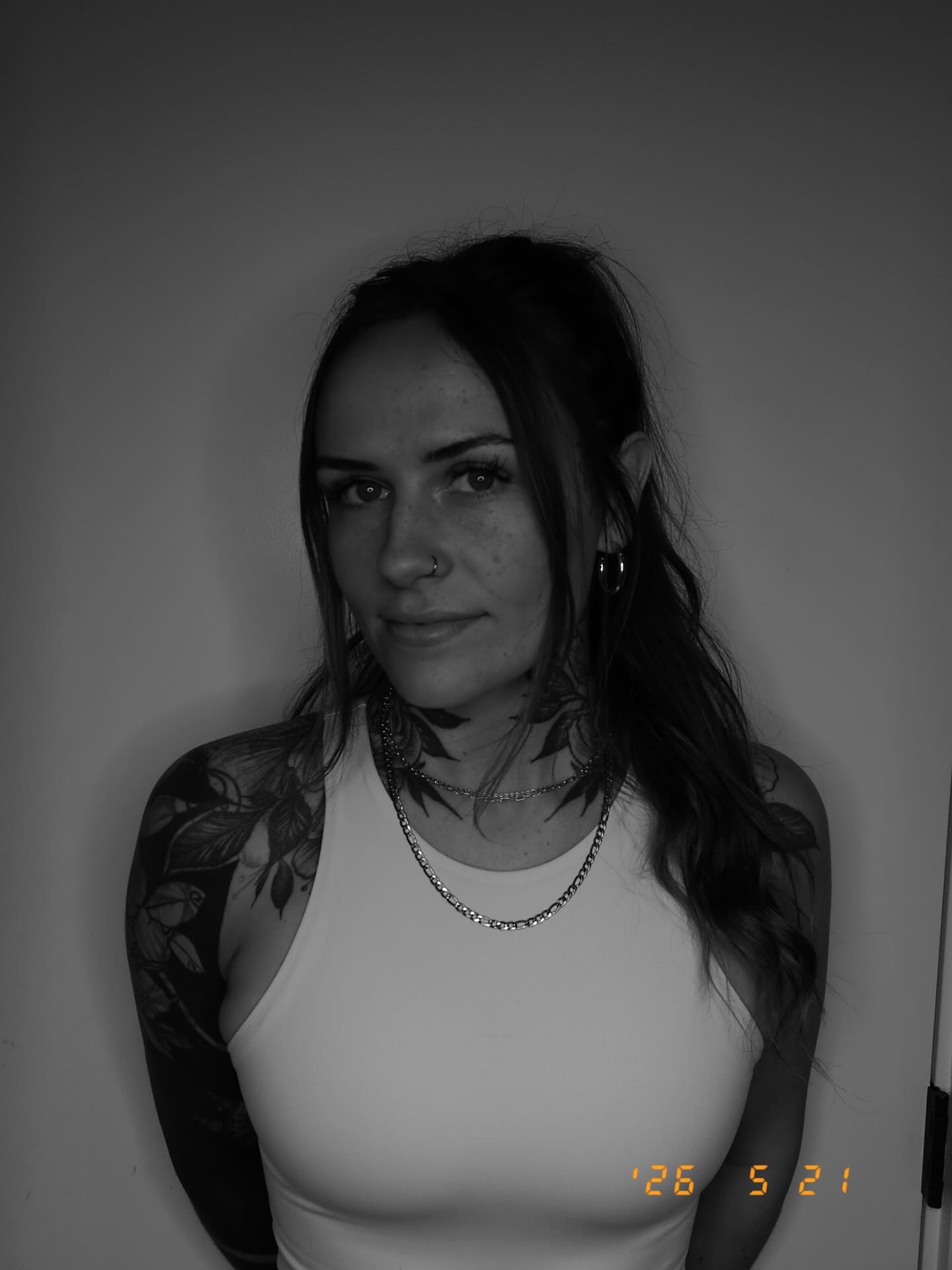 Floral black and grey tattoo on the shoulder by Gabrielle Mack