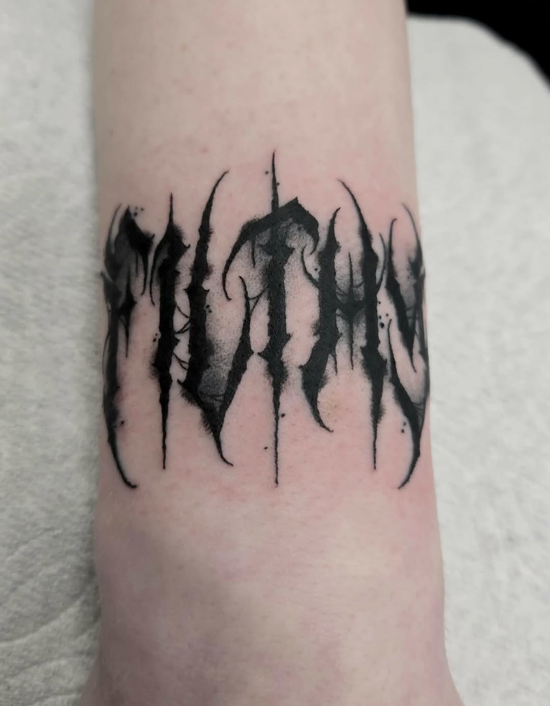 Tattoo by @heathen_tattooer โ lettering_script, blackwork