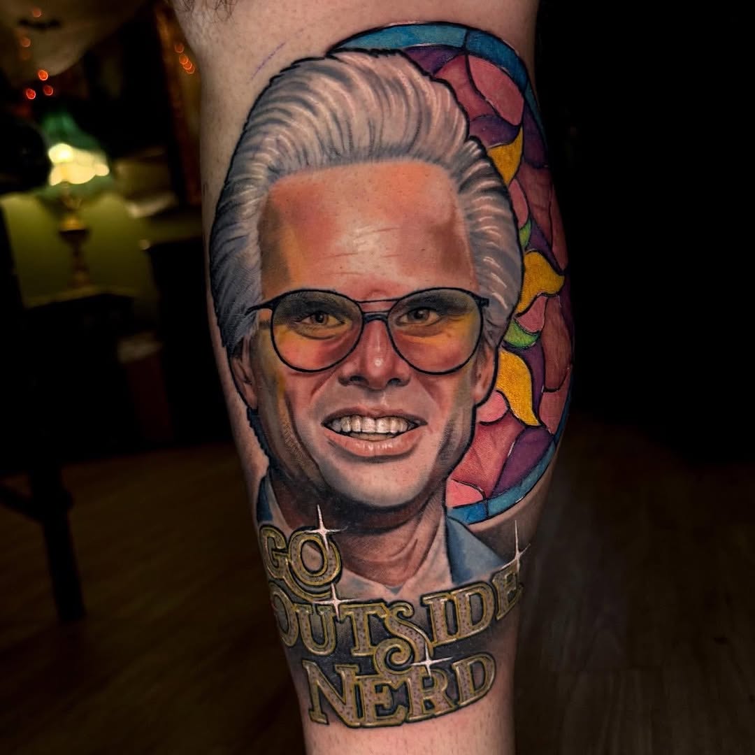 Portrait with text tattoo on the forearm by Sean Flood