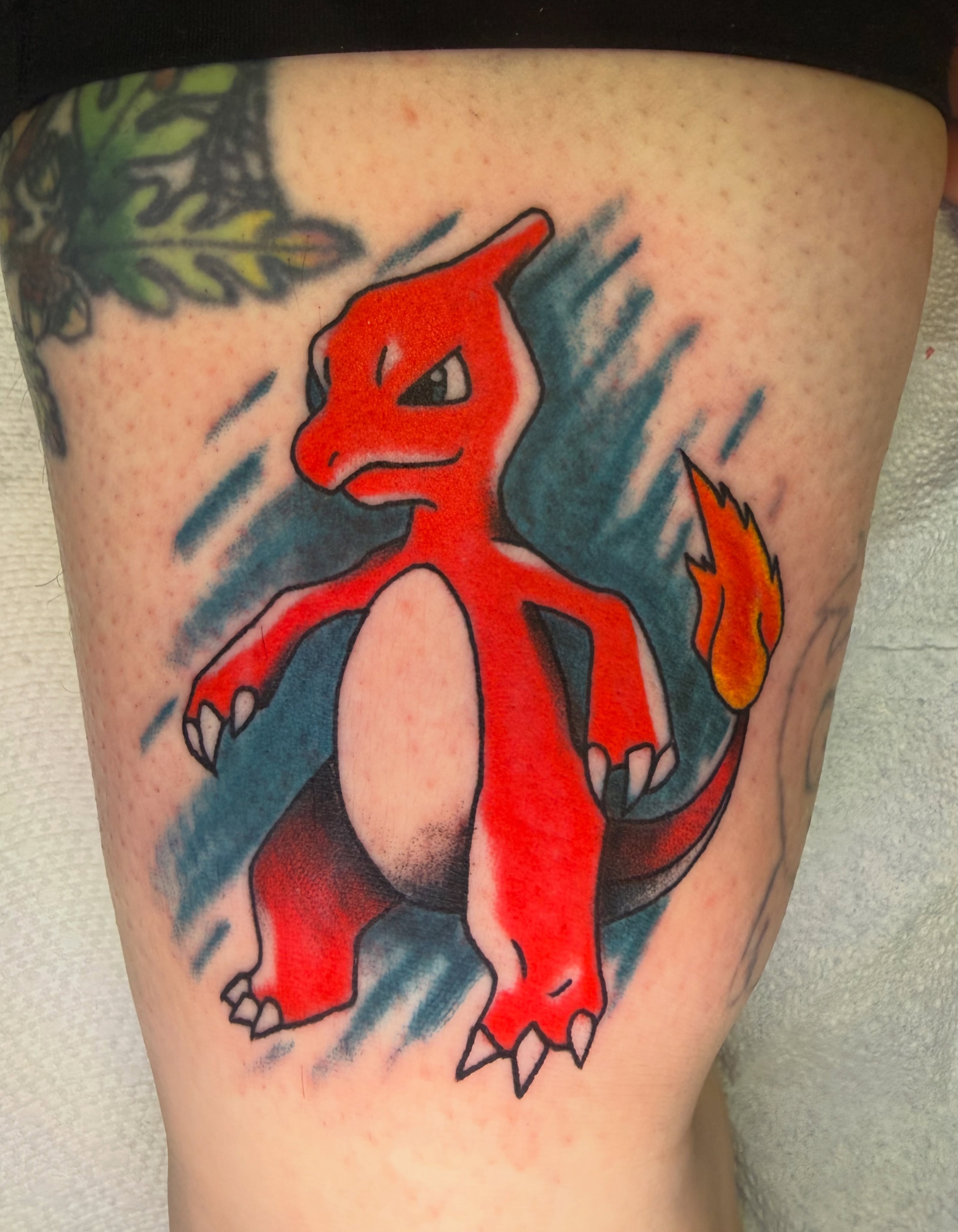Charizard new school tattoo on the thigh by π Erin Stephens π€