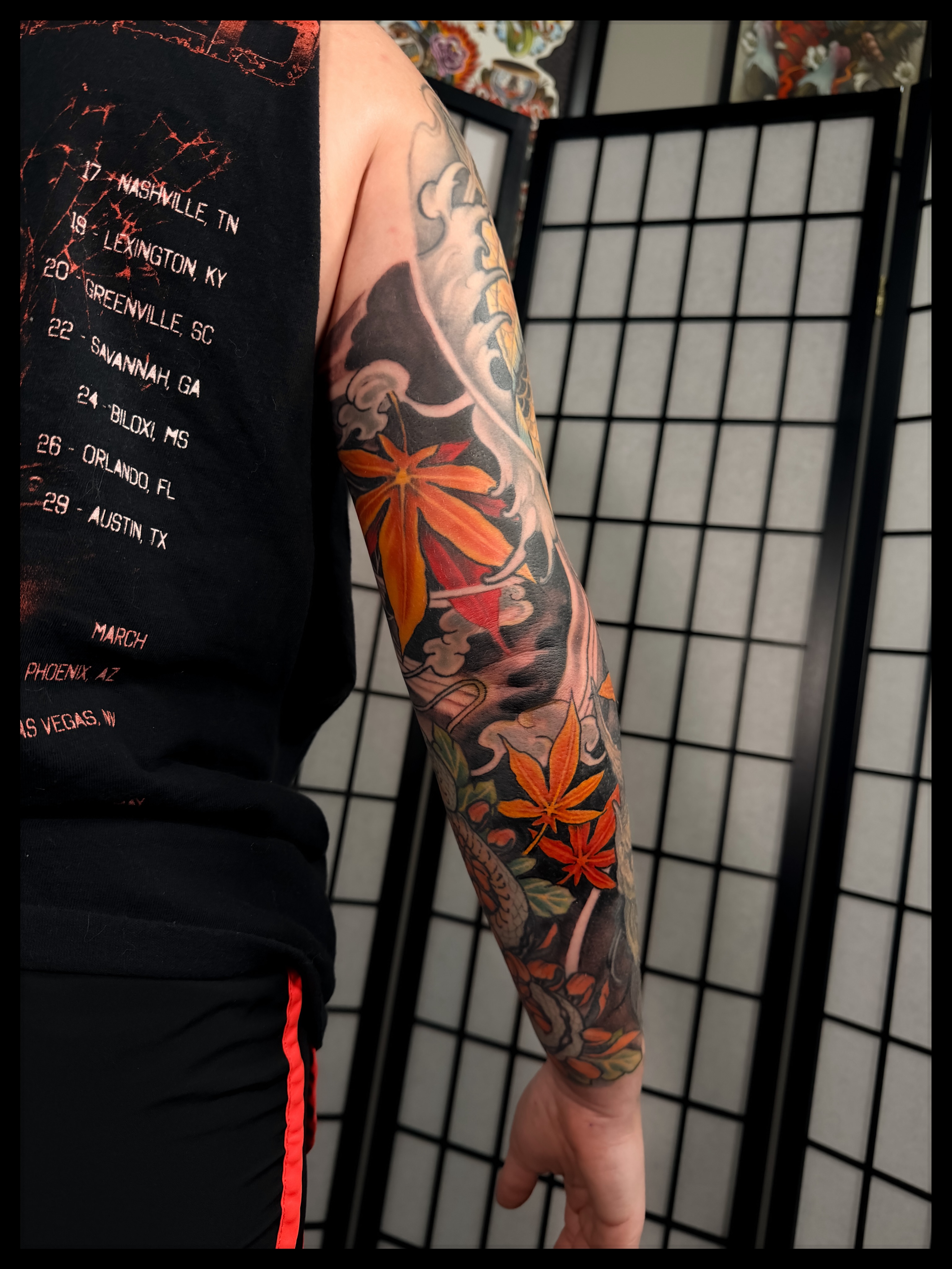 Maple leaves and dragon japanese irezumi tattoo on the forearm by Noah Morris