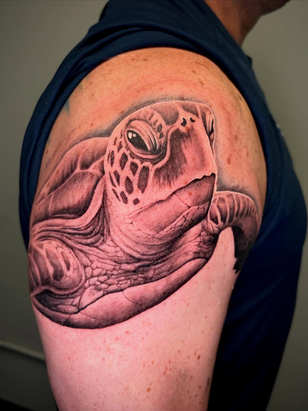 Sea turtle portrait realism tattoo on the shoulder by Bryce Presley, Mission, Kansas