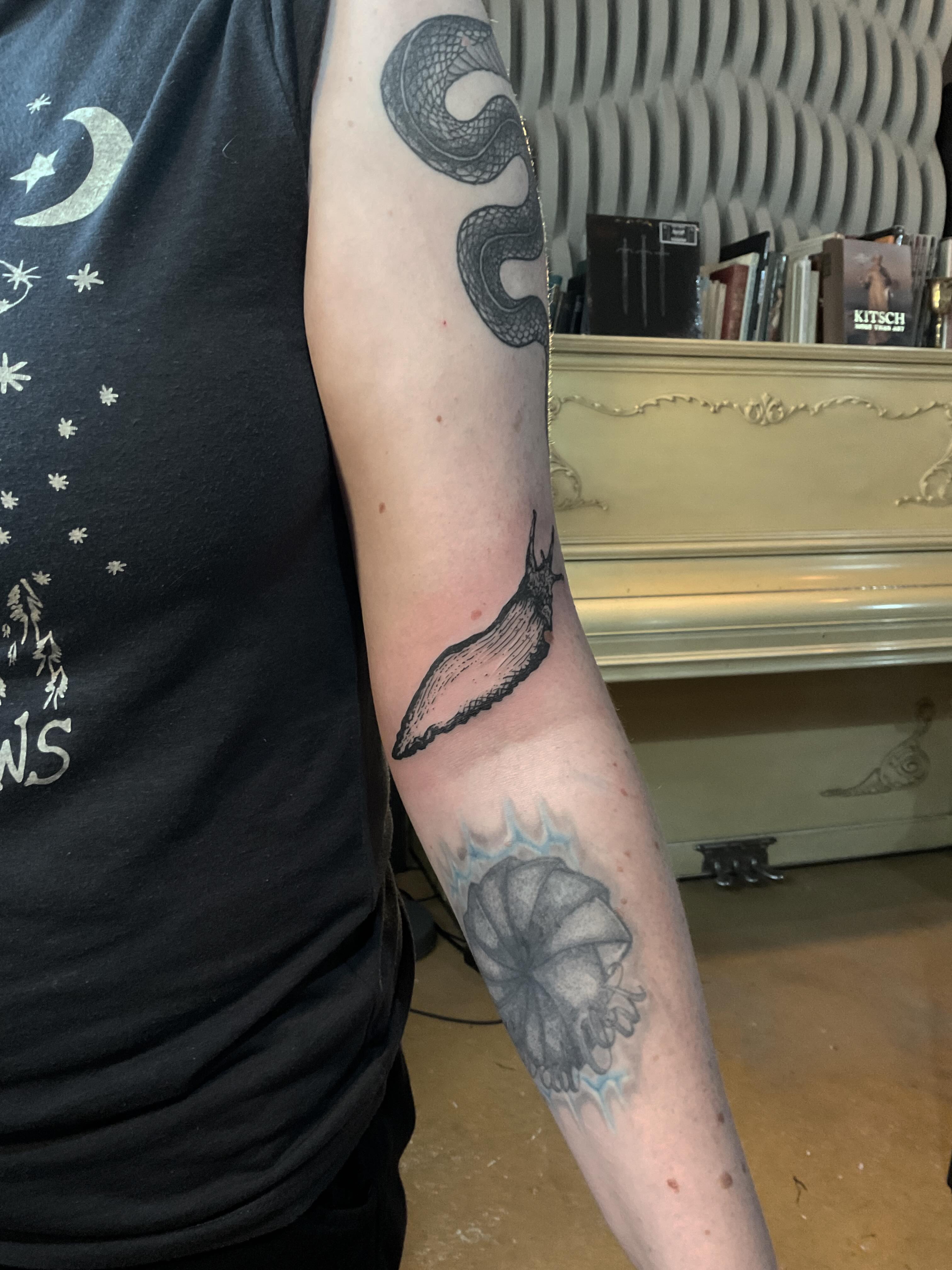 Eggplant black and grey tattoo on the forearm by ๐ญ๐๐๐๐