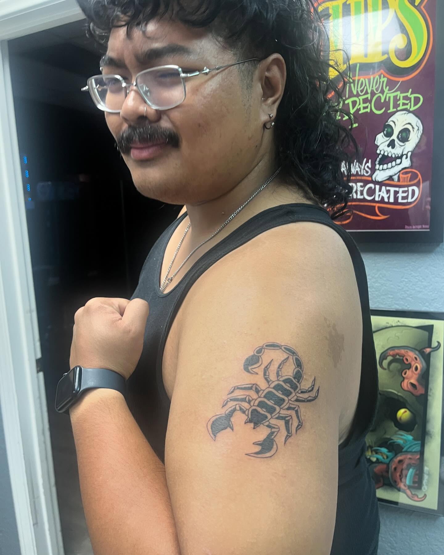 Scorpion black and grey tattoo on the upper arm by Kevin, Las Vegas, Nevada