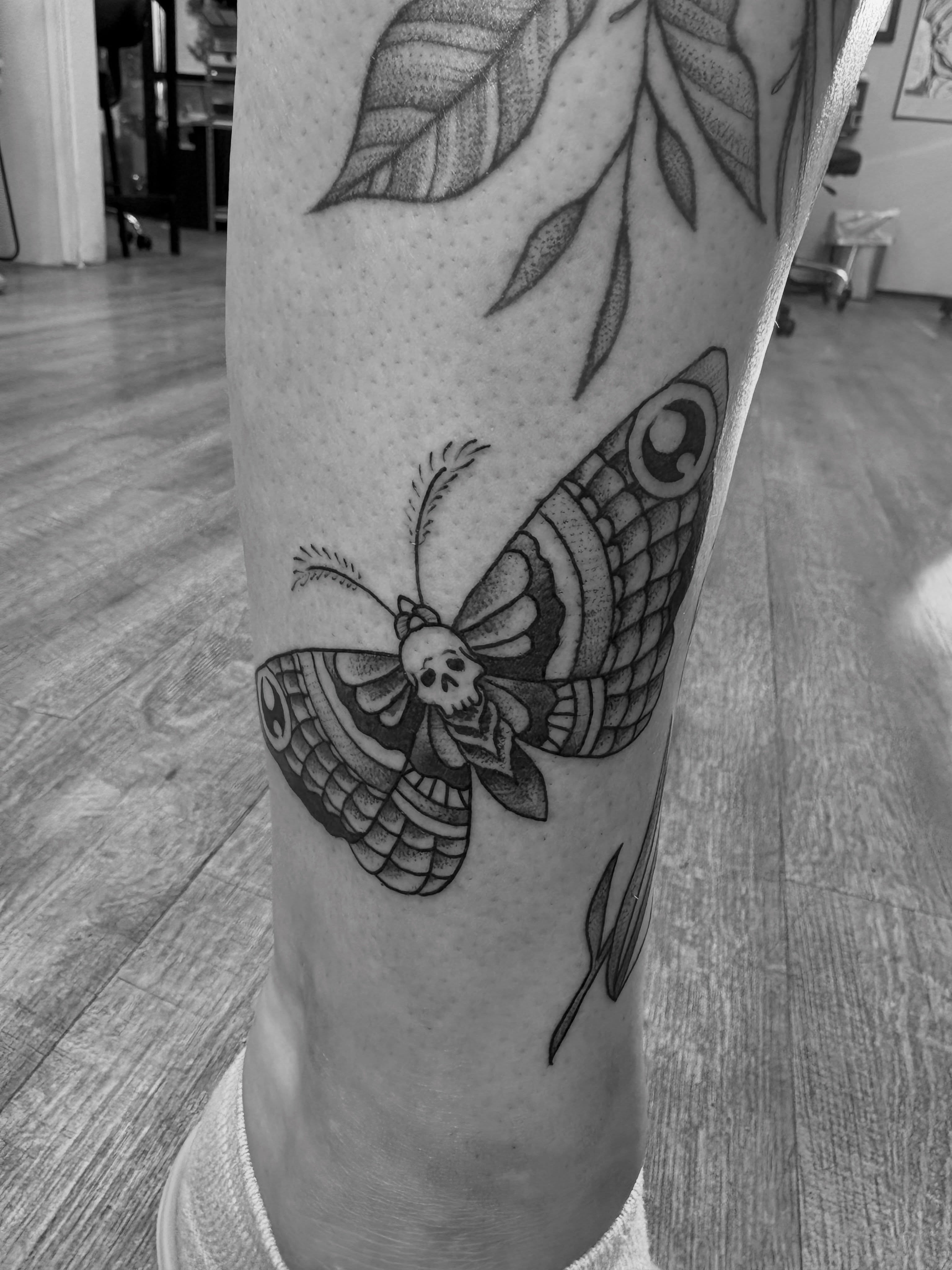 Death moth black and grey tattoo on the forearm by Jason Allen, Avondale, Arizona